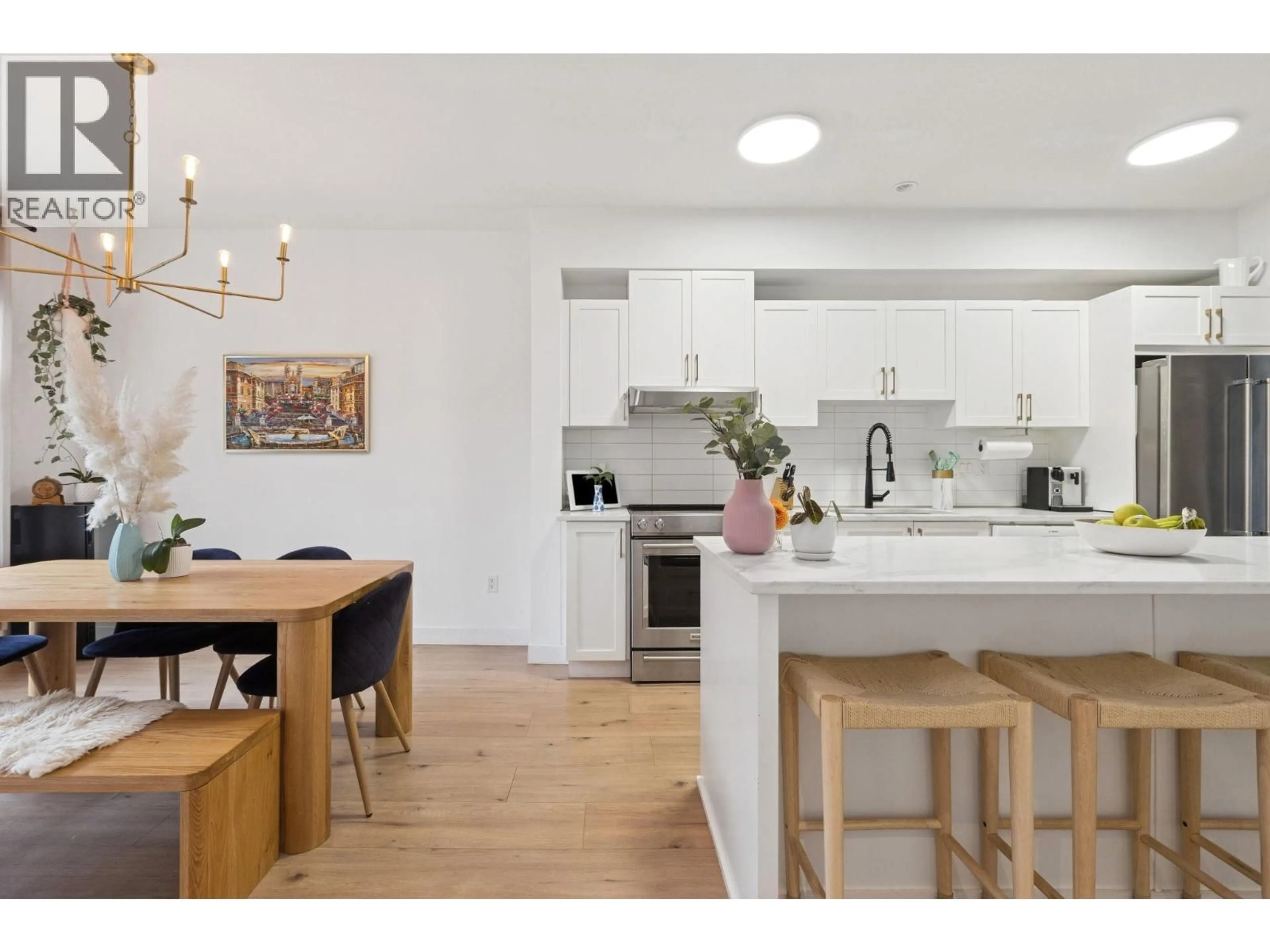 Open concept kitchen, wood/laminate floor for 772 ORWELL STREET, North Vancouver British Columbia V7J0A5