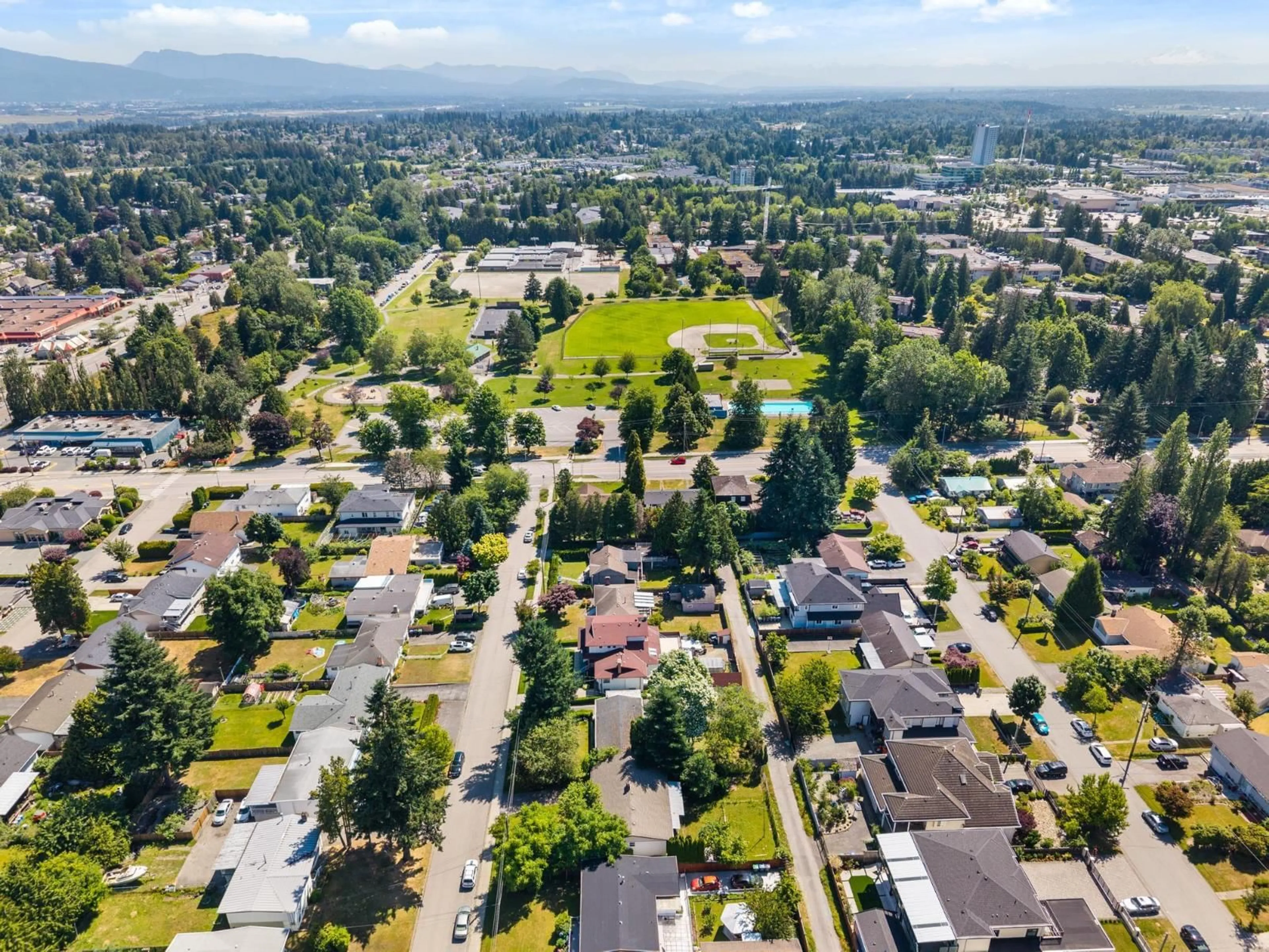 A pic from outside/outdoor area/front of a property/back of a property/a pic from drone, street for 14730 107, Surrey British Columbia V3R1T8