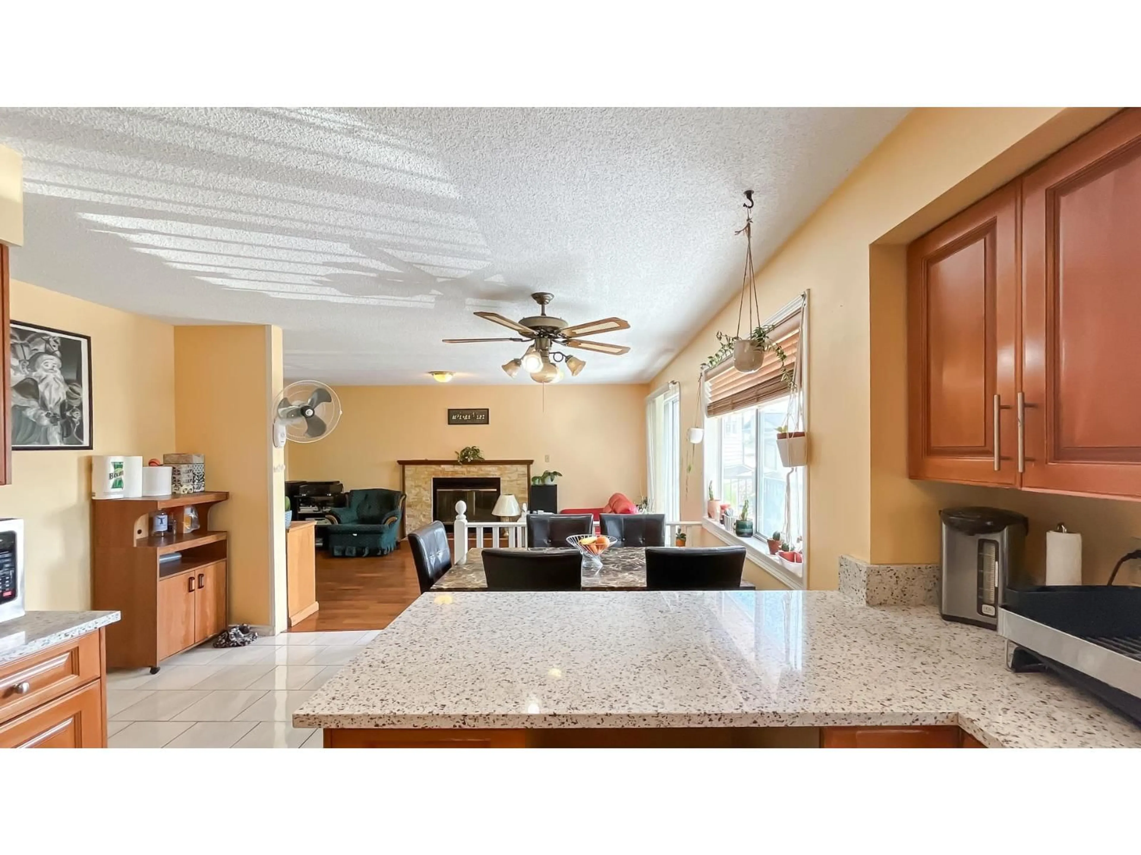 Open concept kitchen, ceramic/tile floor for 9392 139, Surrey British Columbia V3V7K9