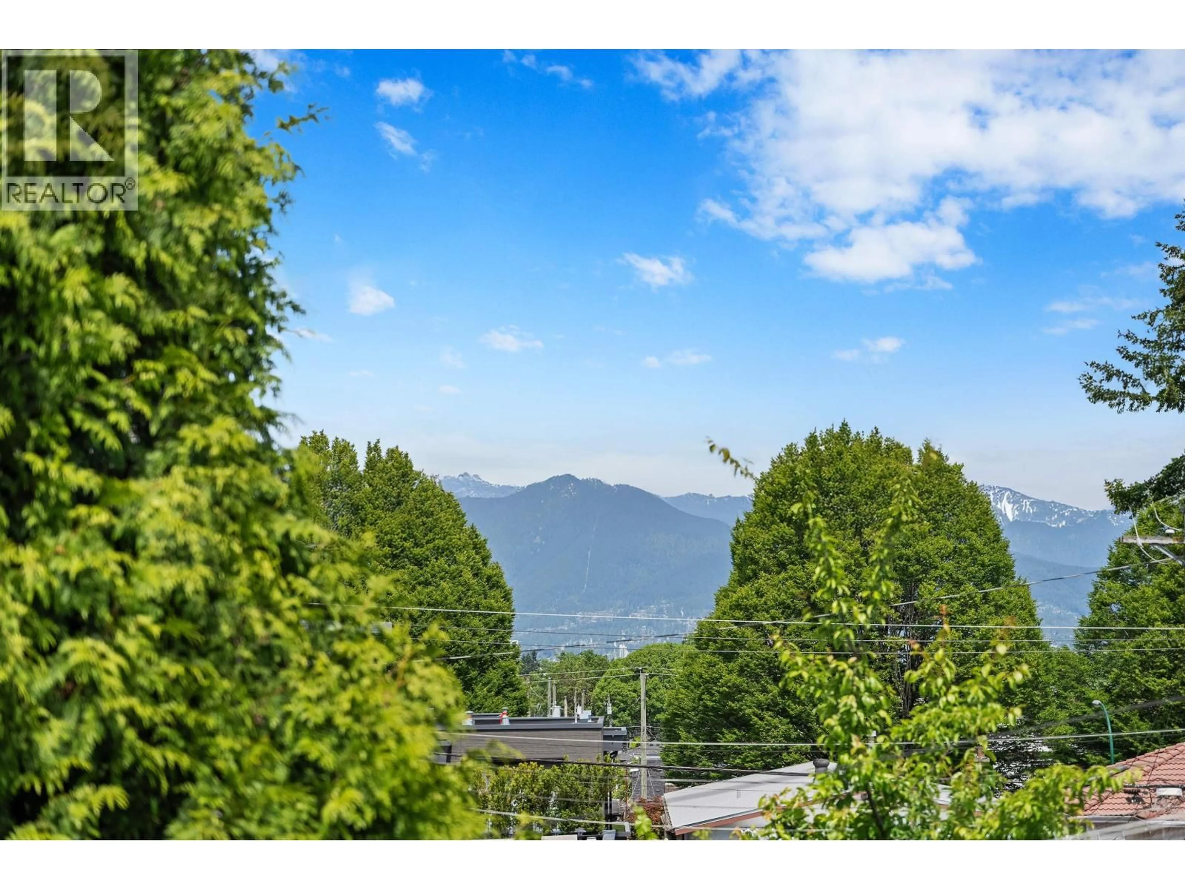 A pic from outside/outdoor area/front of a property/back of a property/a pic from drone, mountain view for 4988 SHERBROOKE STREET, Vancouver British Columbia V5W3M2