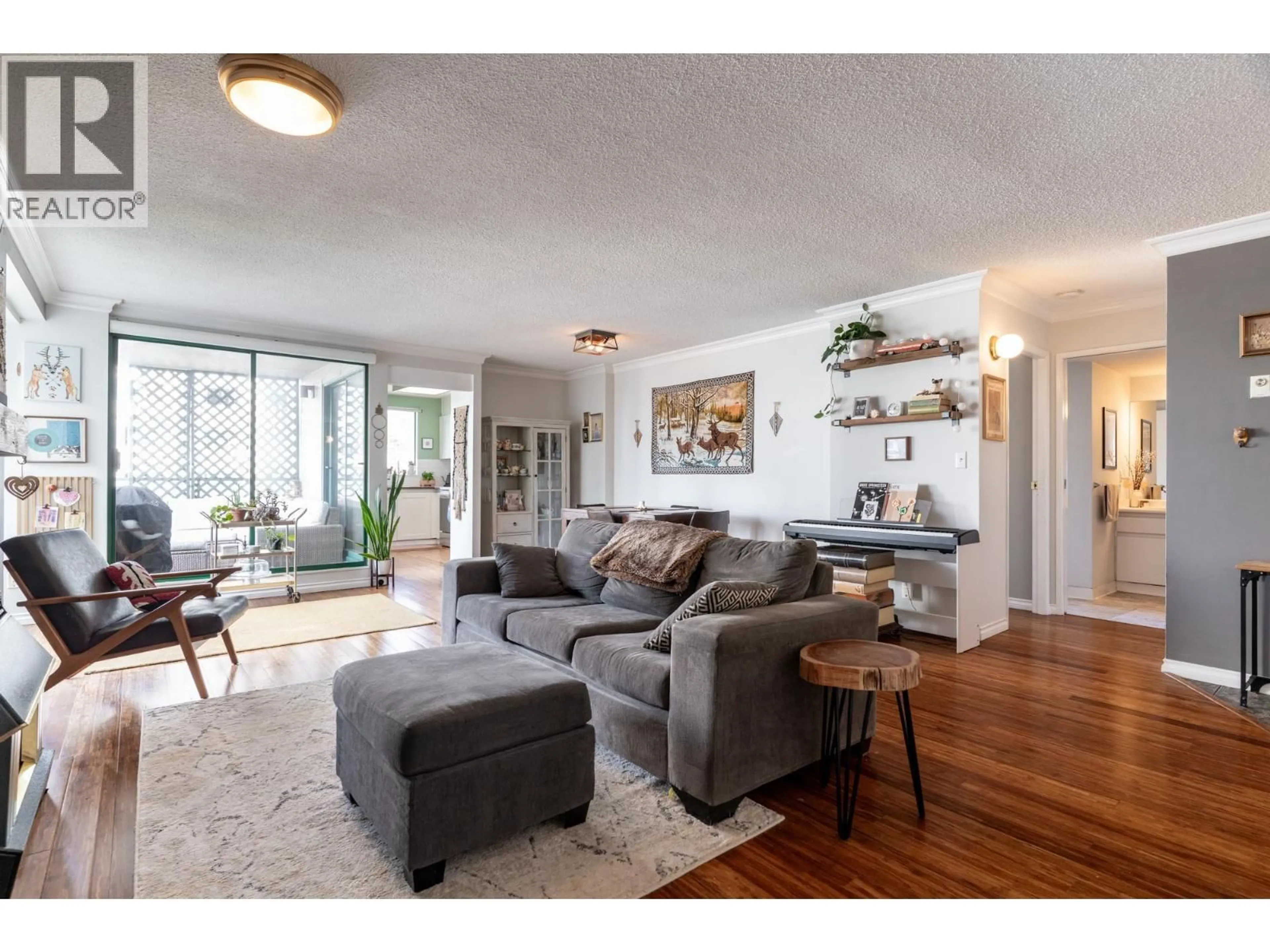Living room with furniture, wood/laminate floor for 703 - 420 CARNARVON STREET, New Westminster British Columbia V3L5P1