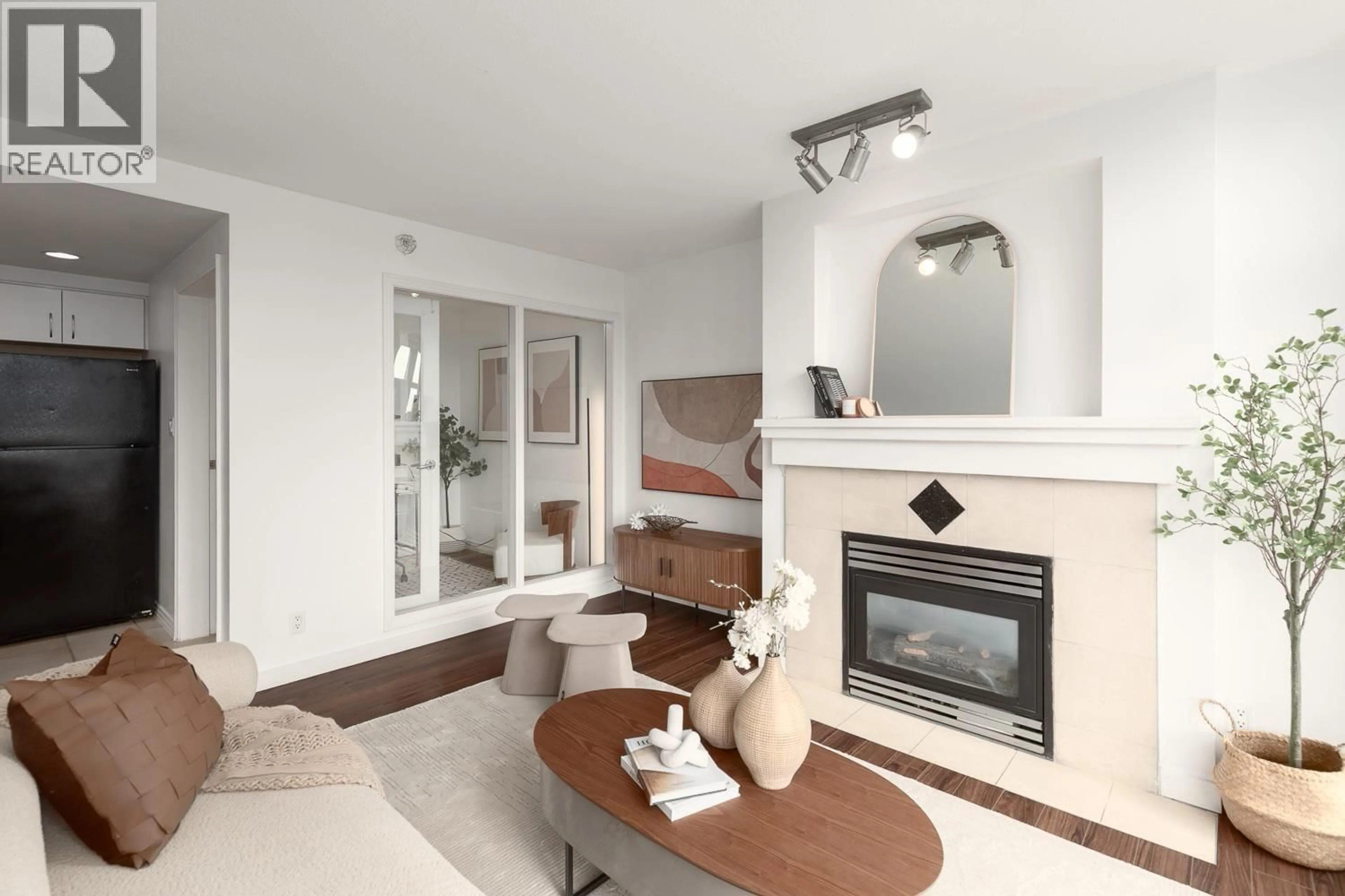 Living room with furniture, ceramic/tile floor for 1907 - 1199 MARINASIDE CRESCENT, Vancouver British Columbia V6Z2Y2