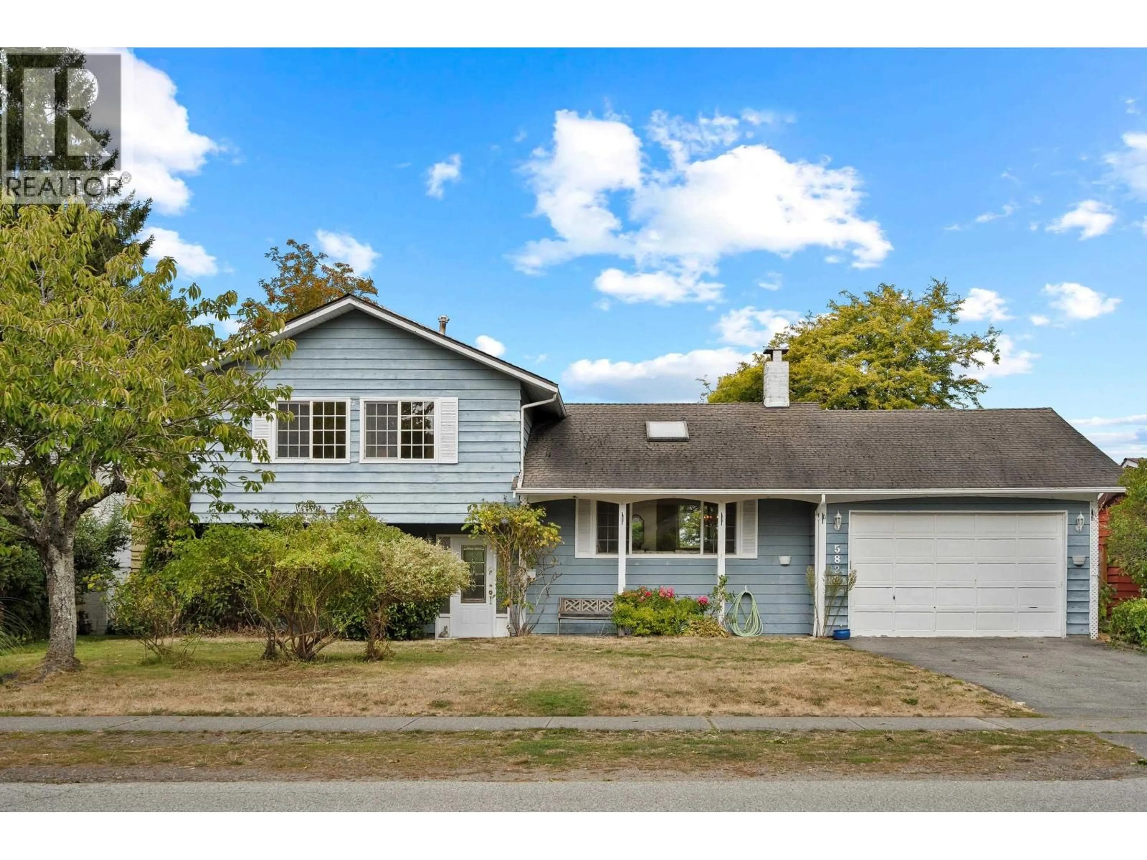 Home with vinyl exterior material, street for 5823 17A AVENUE, Delta British Columbia V4L1J3