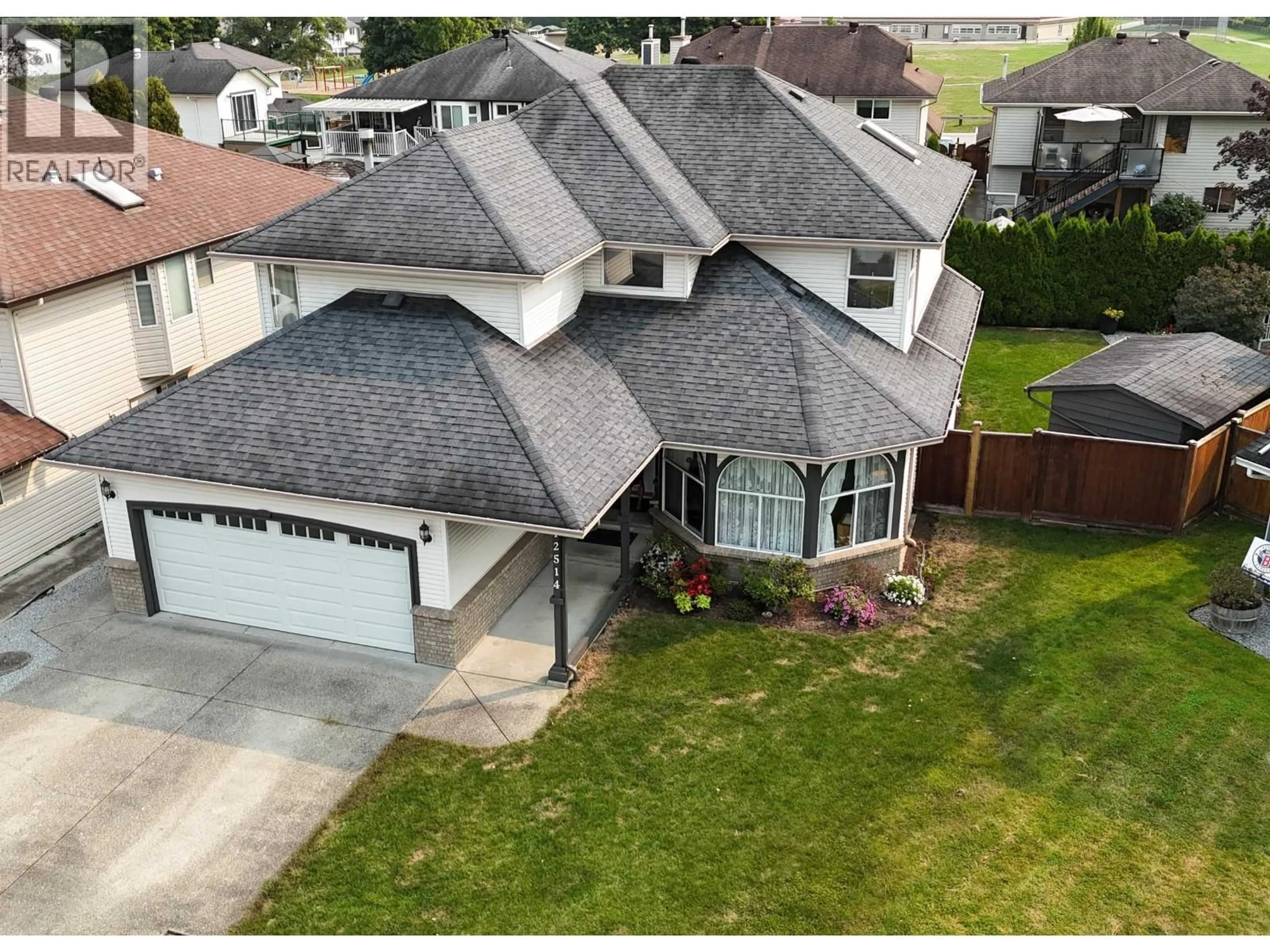A pic from outside/outdoor area/front of a property/back of a property/a pic from drone, street for 12514 220 STREET, Maple Ridge British Columbia V2X0V6