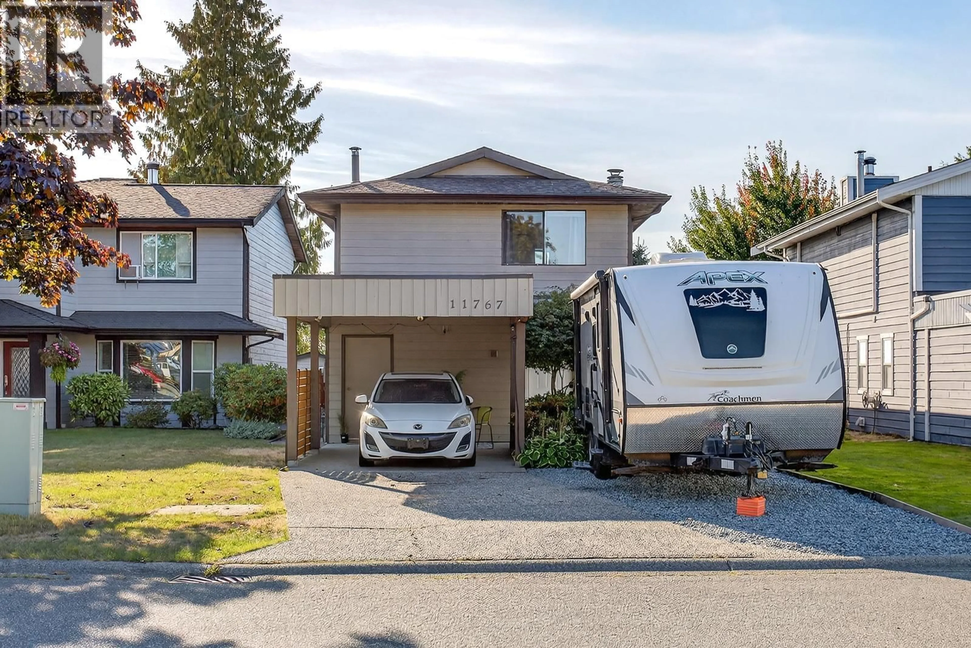 Home with vinyl exterior material, street for 11767 190 STREET, Pitt Meadows British Columbia V3Y1Y2