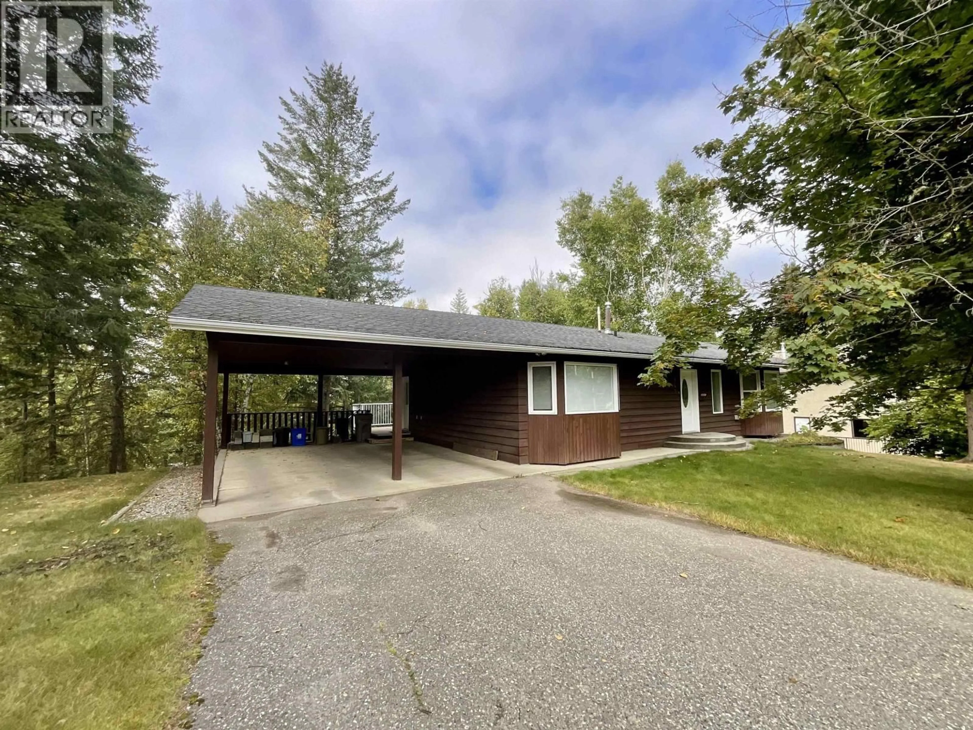A pic from outside/outdoor area/front of a property/back of a property/a pic from drone, street for 143 GROSZ S ROAD, Quesnel British Columbia V2J4H1