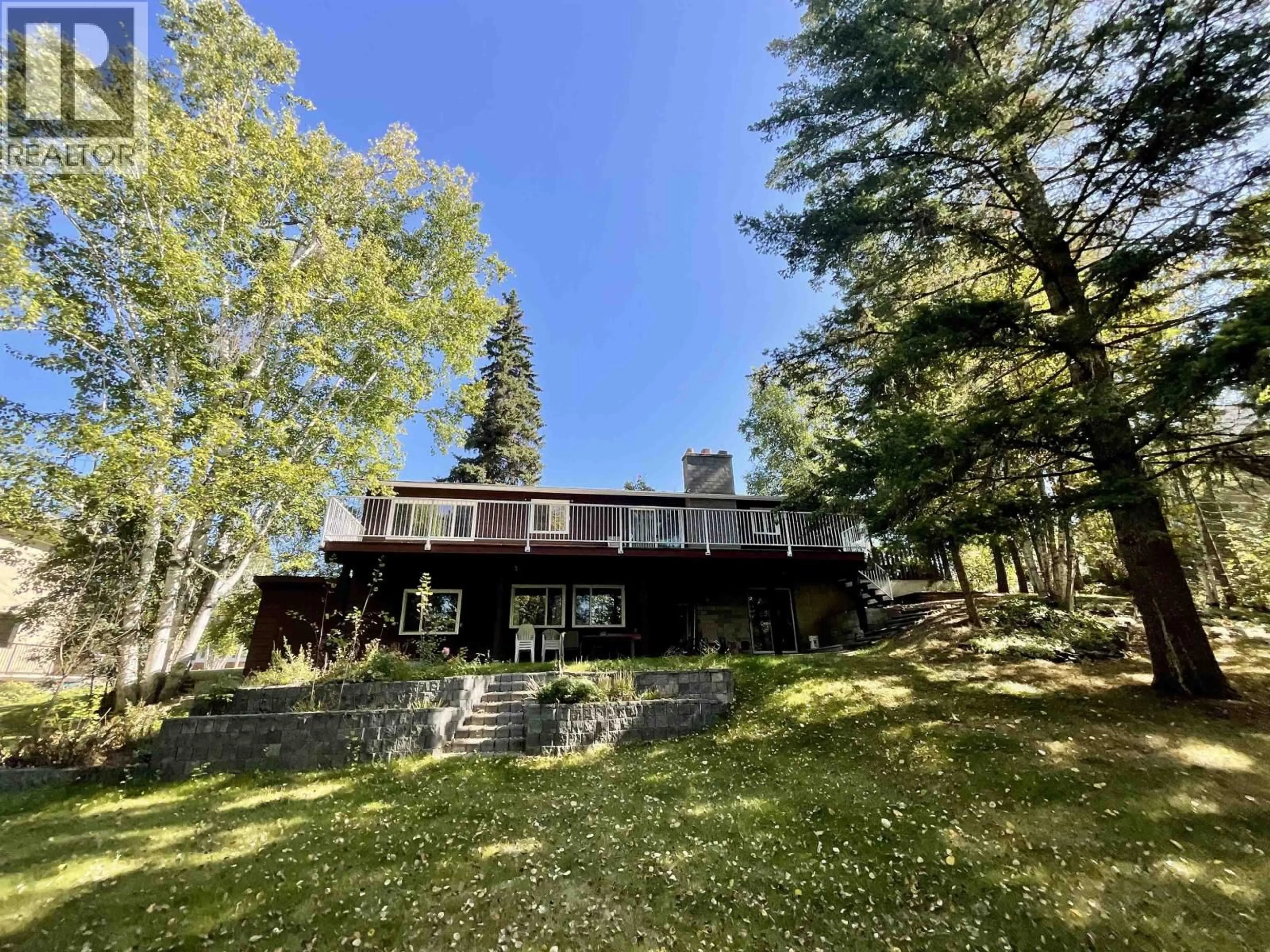 A pic from outside/outdoor area/front of a property/back of a property/a pic from drone, forest/trees view for 143 GROSZ S ROAD, Quesnel British Columbia V2J4H1