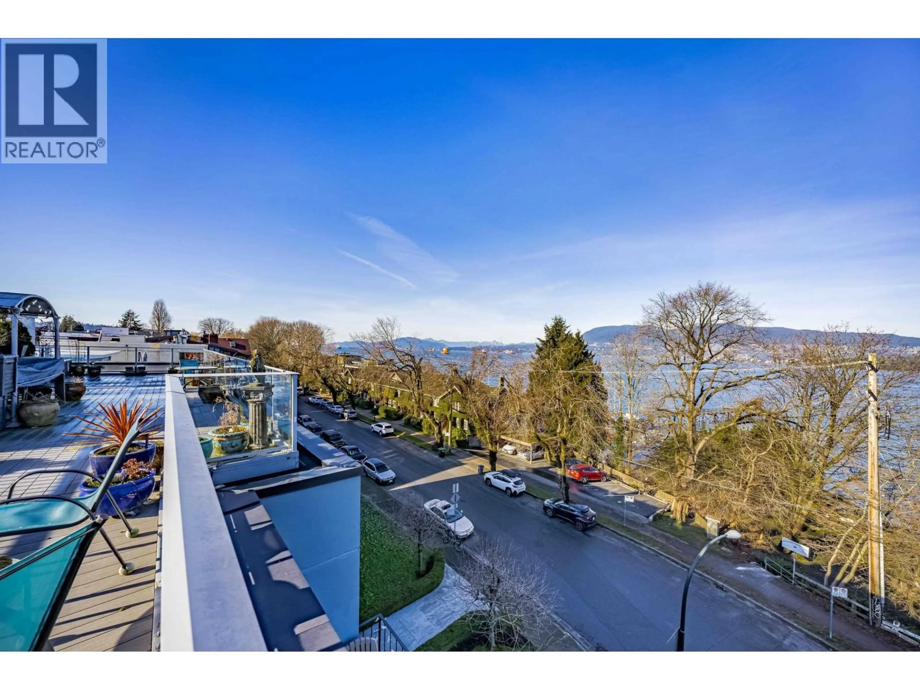 A pic from outside/outdoor area/front of a property/back of a property/a pic from drone, mountain view for 305 - 2430V POINT GREY ROAD, Vancouver British Columbia V6K1A2