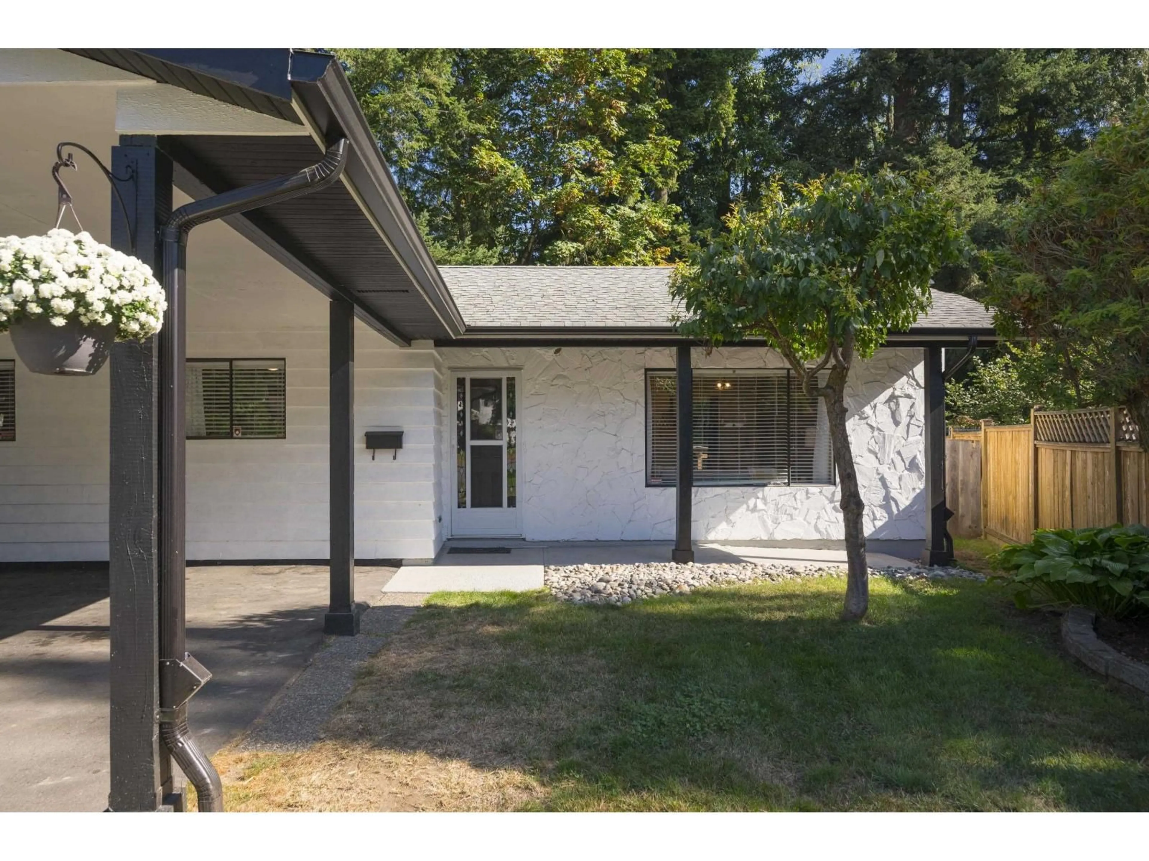 Home with vinyl exterior material, street for 4640 203A, Langley British Columbia V3A5K1