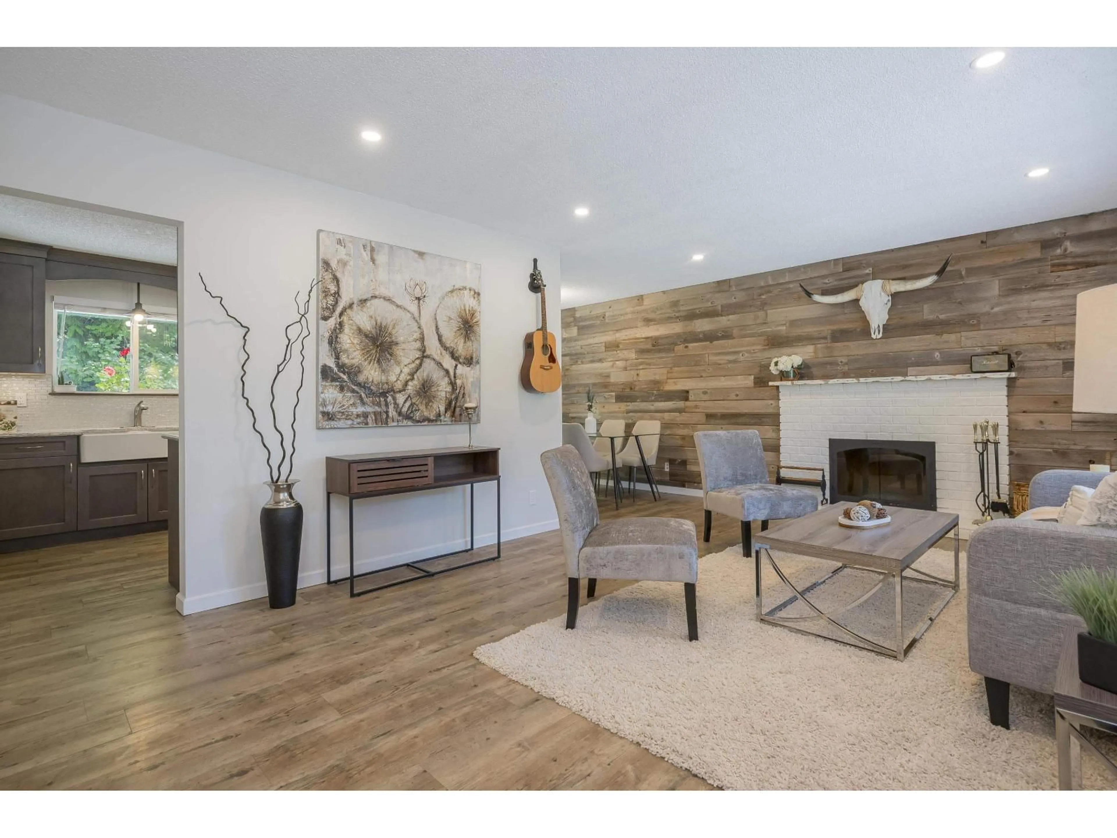 Living room with furniture, wood/laminate floor for 4640 203A, Langley British Columbia V3A5K1
