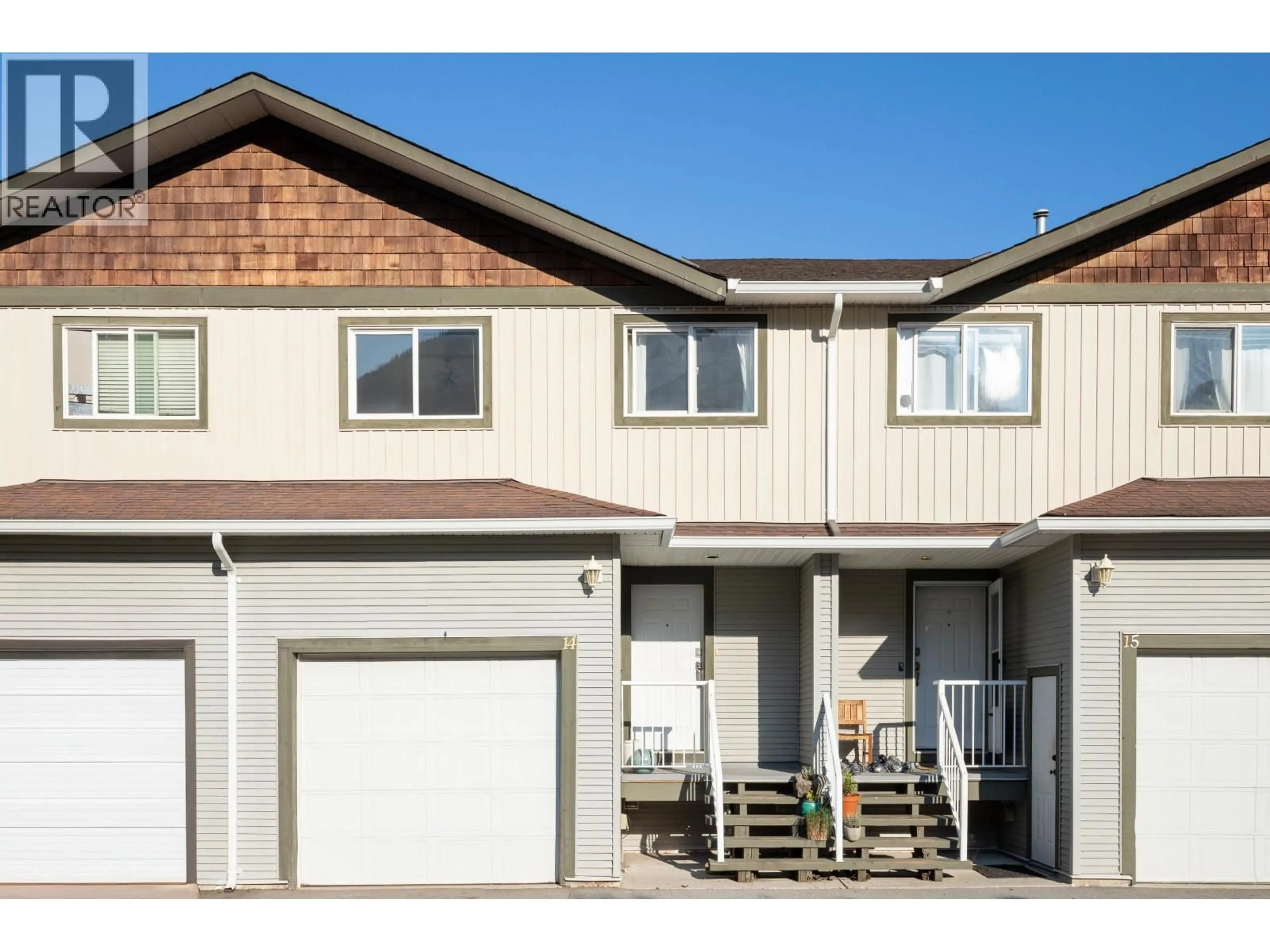 Home with vinyl exterior material, street for 14 - 39754 GOVERNMENT ROAD, Squamish British Columbia V8B0G3