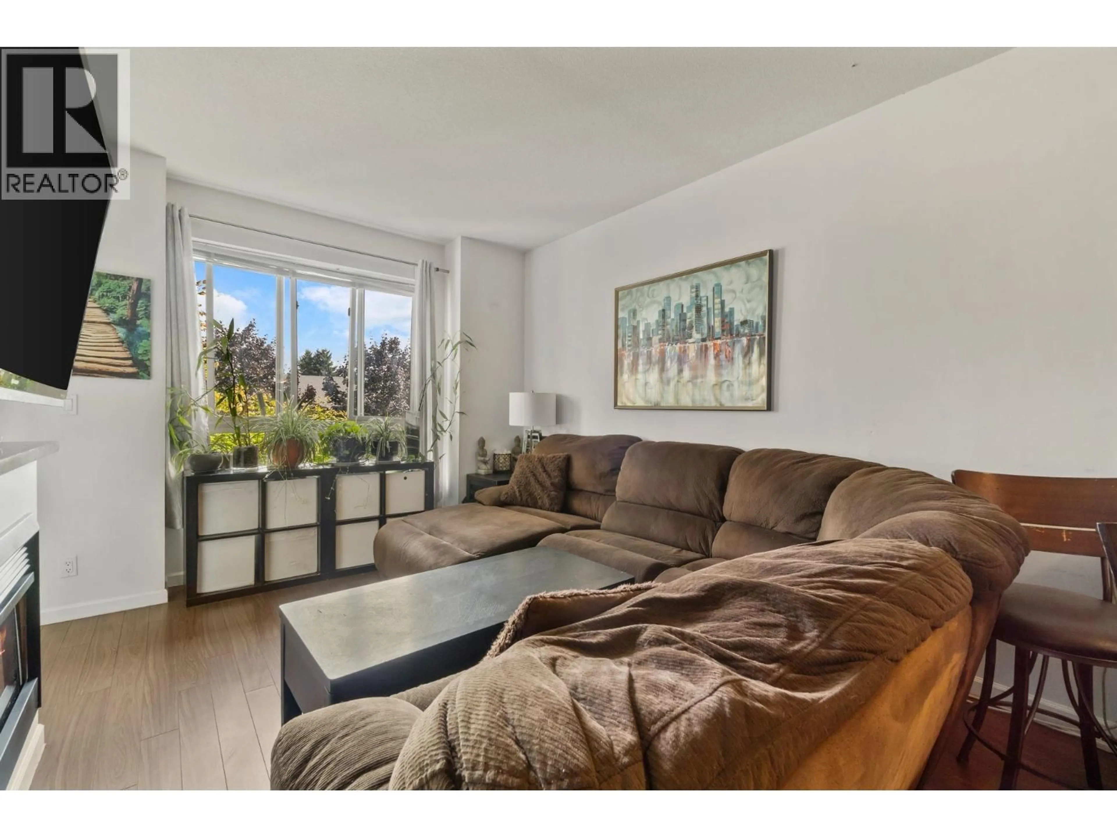 Living room with furniture, unknown for 201 - 290 FRANCIS WAY, New Westminster British Columbia V3L0C4