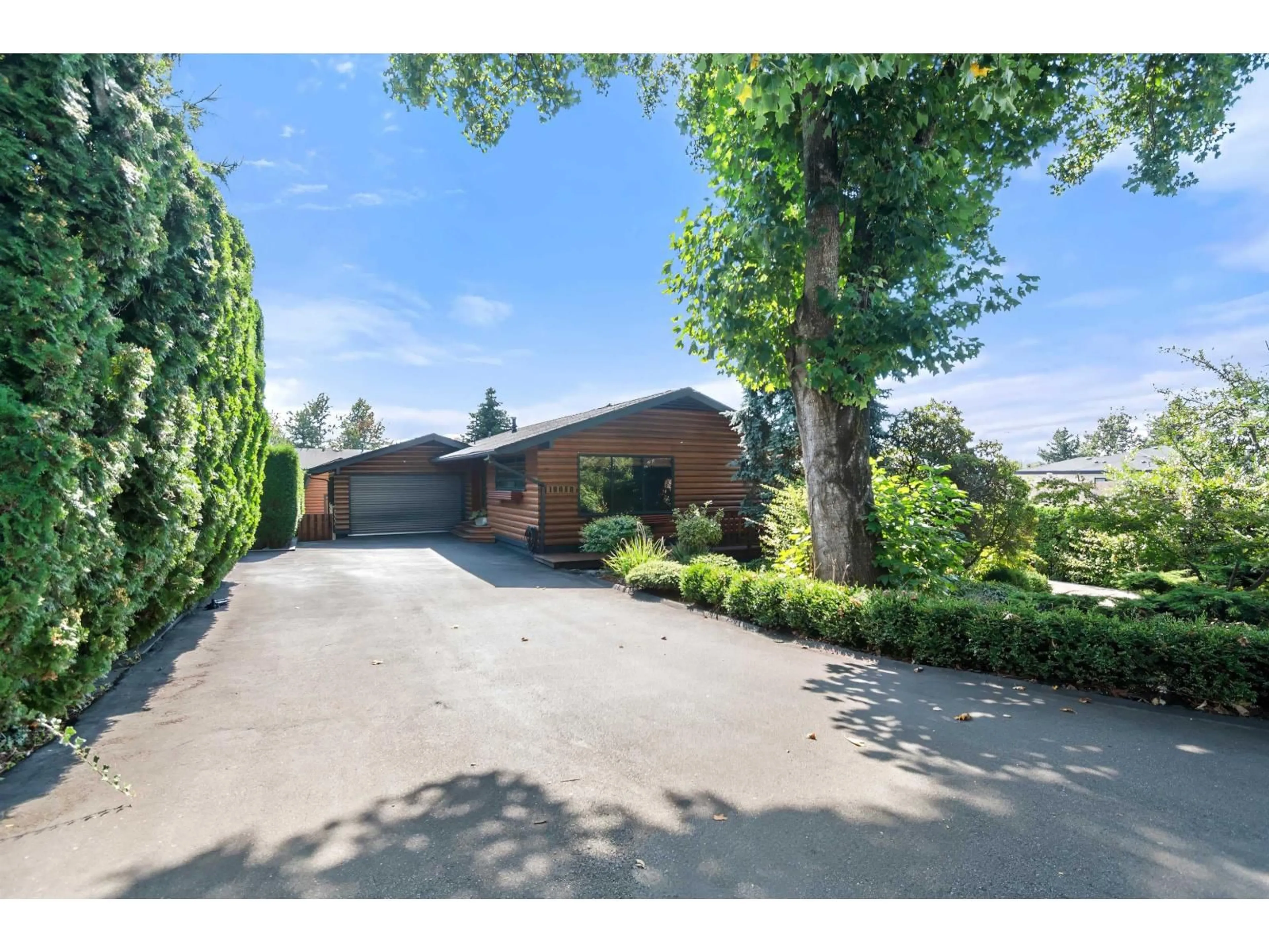 A pic from outside/outdoor area/front of a property/back of a property/a pic from drone, street for 18058 57A AVENUE, Surrey British Columbia V3S1J6