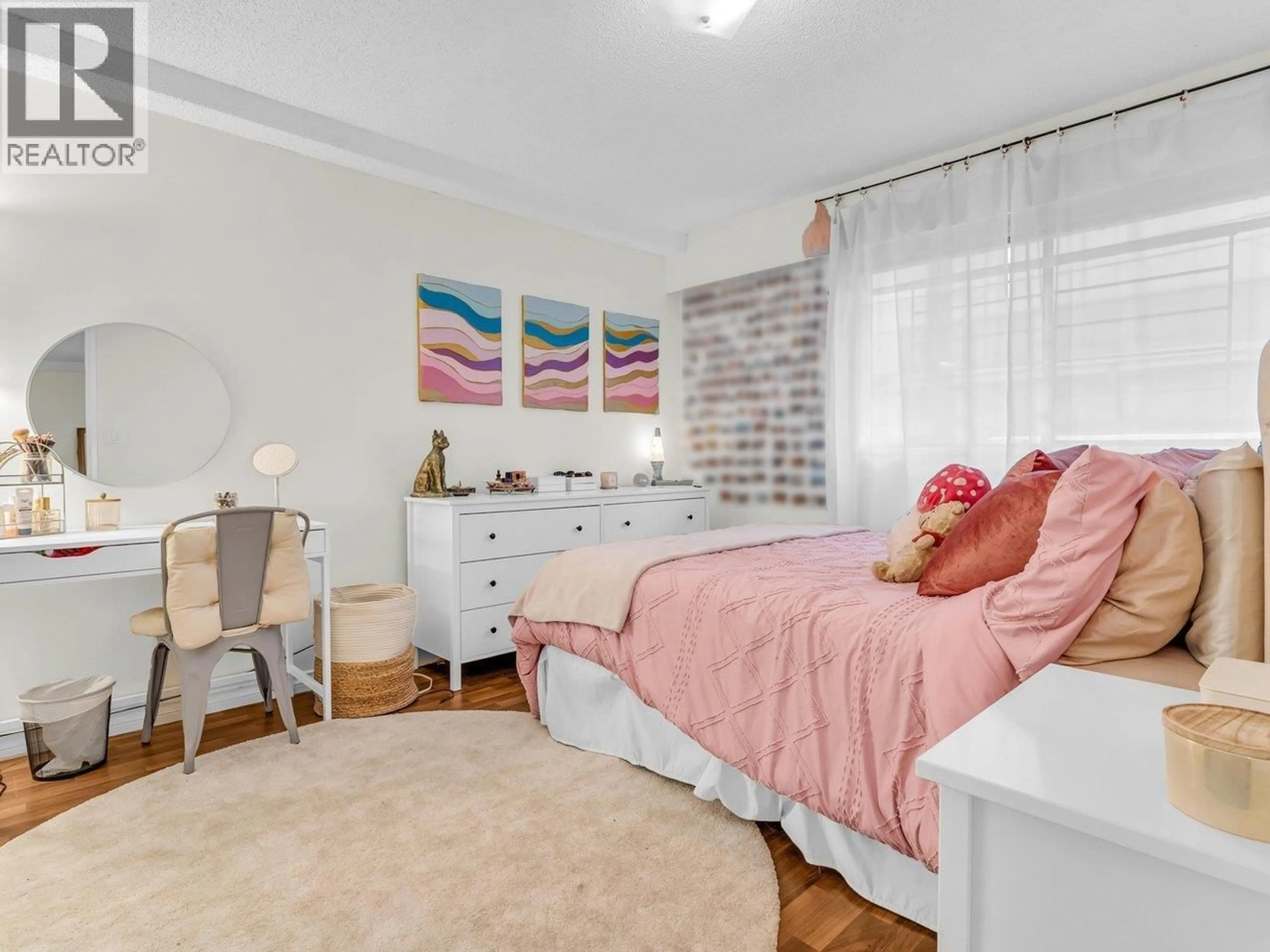 Bedroom with bed, unknown for 103 - 2190 8TH AVENUE, Vancouver British Columbia V6K2A4
