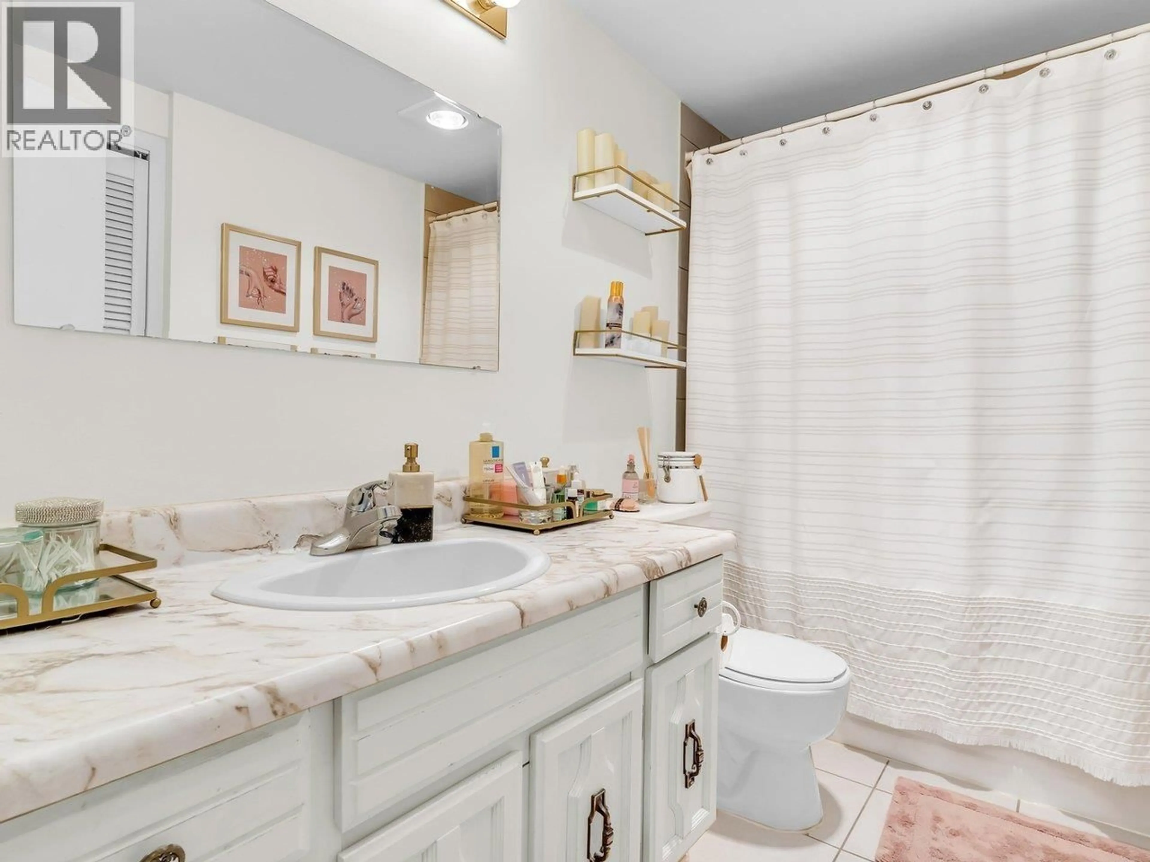 Standard bathroom, ceramic/tile floor for 103 - 2190 8TH AVENUE, Vancouver British Columbia V6K2A4