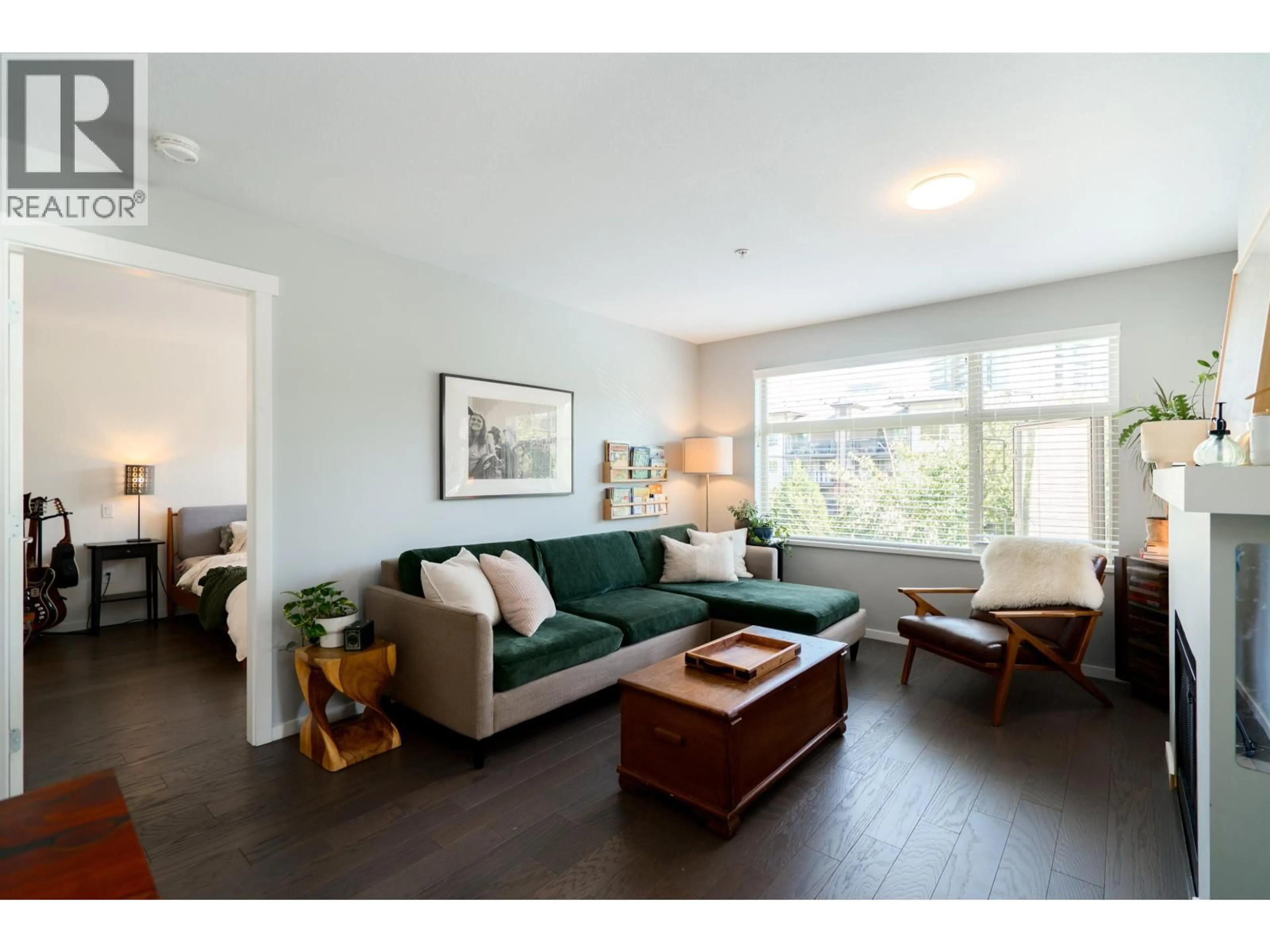 Living room with furniture, wood/laminate floor for 309 - 500 KLAHANIE DRIVE, Port Moody British Columbia V3H5L1