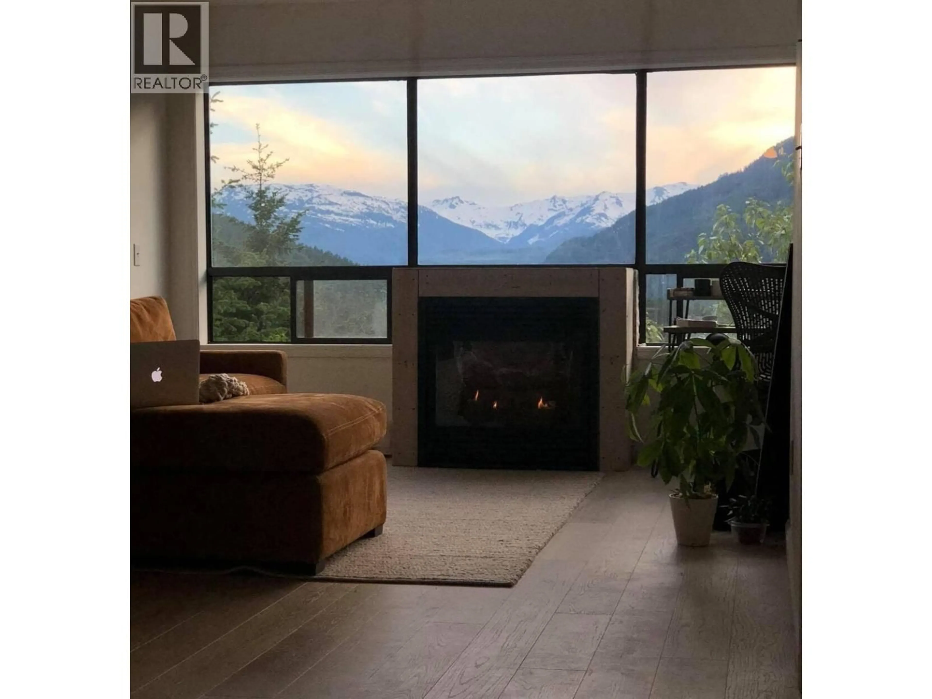 Living room with furniture, unknown for 310 - 2221 GONDOLA WAY, Whistler British Columbia V8E0M8
