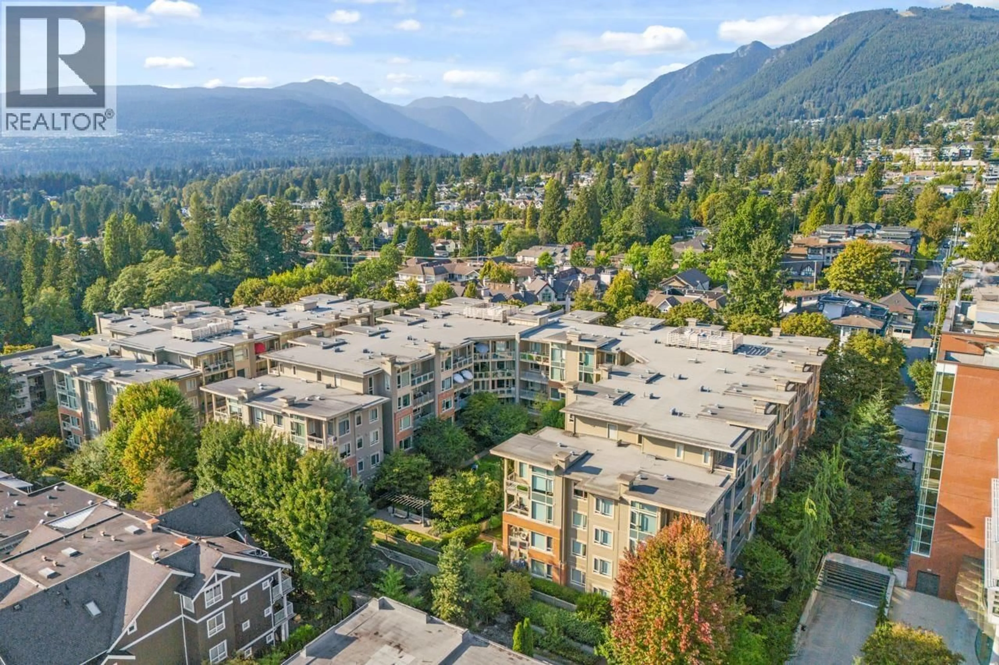 A pic from outside/outdoor area/front of a property/back of a property/a pic from drone, mountain view for 310 - 119 22ND STREET, North Vancouver British Columbia V7M0B4
