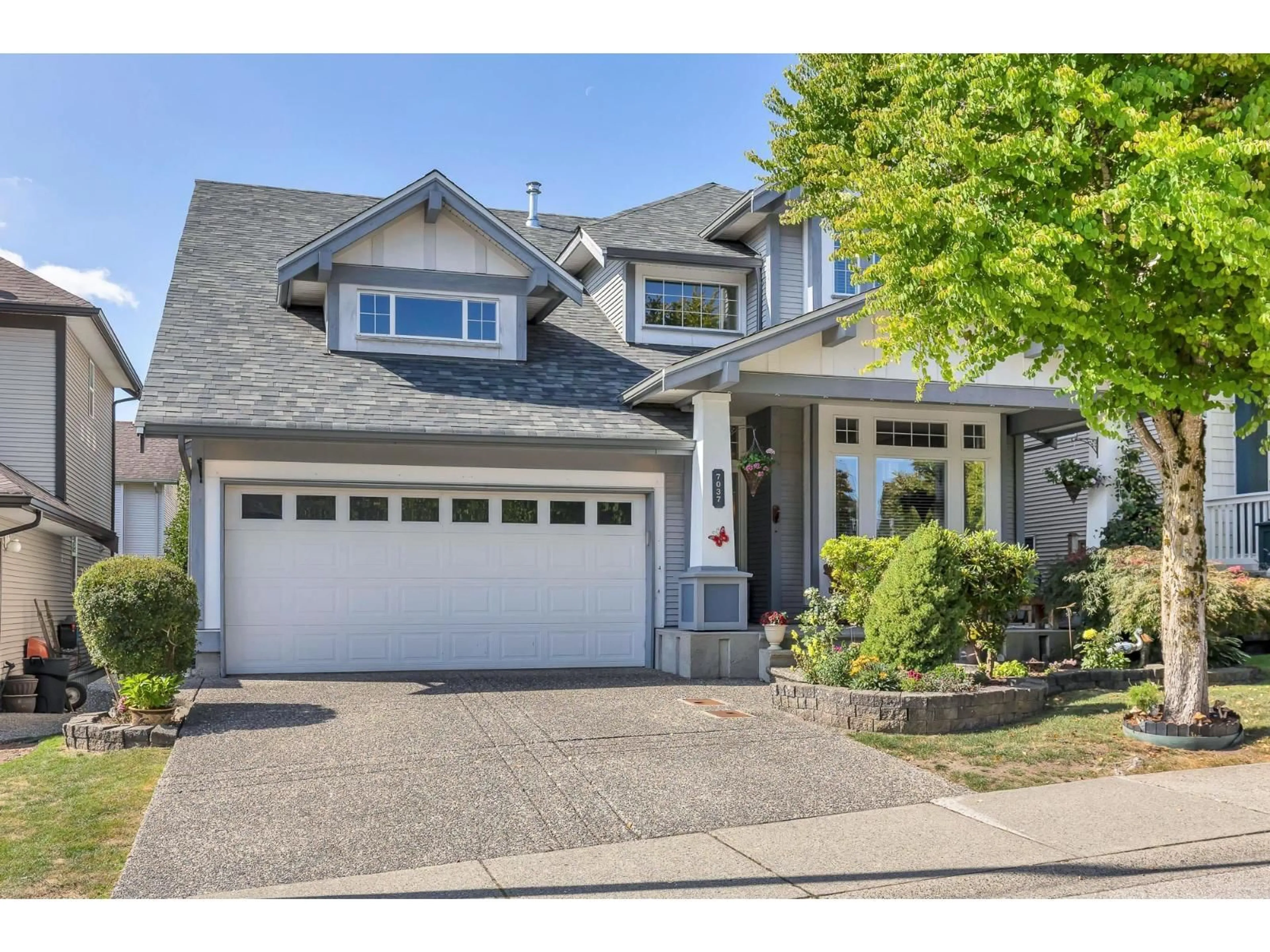 Home with vinyl exterior material, street for 7037 201, Langley British Columbia V2Y2Z3
