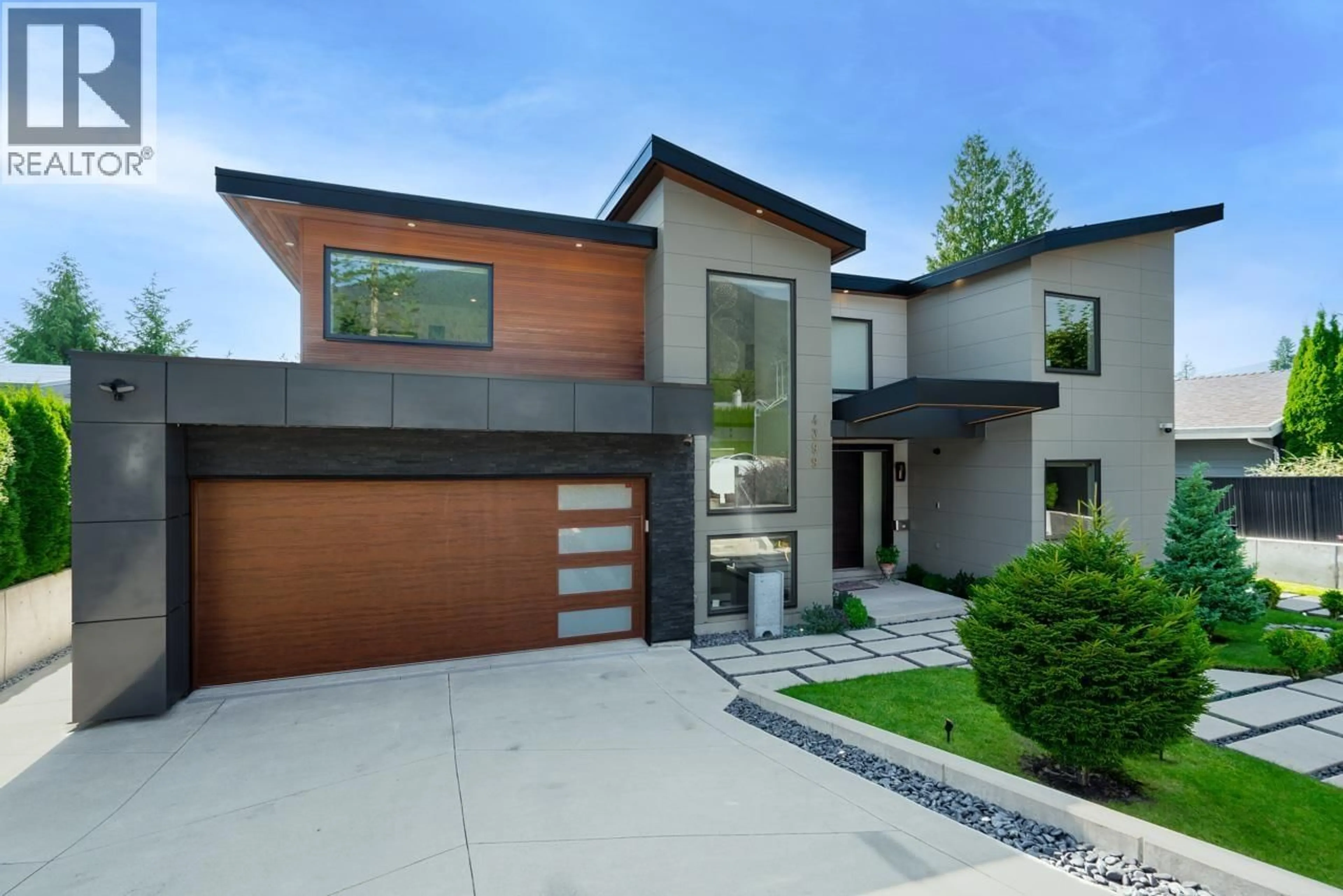 Home with brick exterior material, street for 4399 HIGHLAND BOULEVARD, North Vancouver British Columbia V7R2Z8