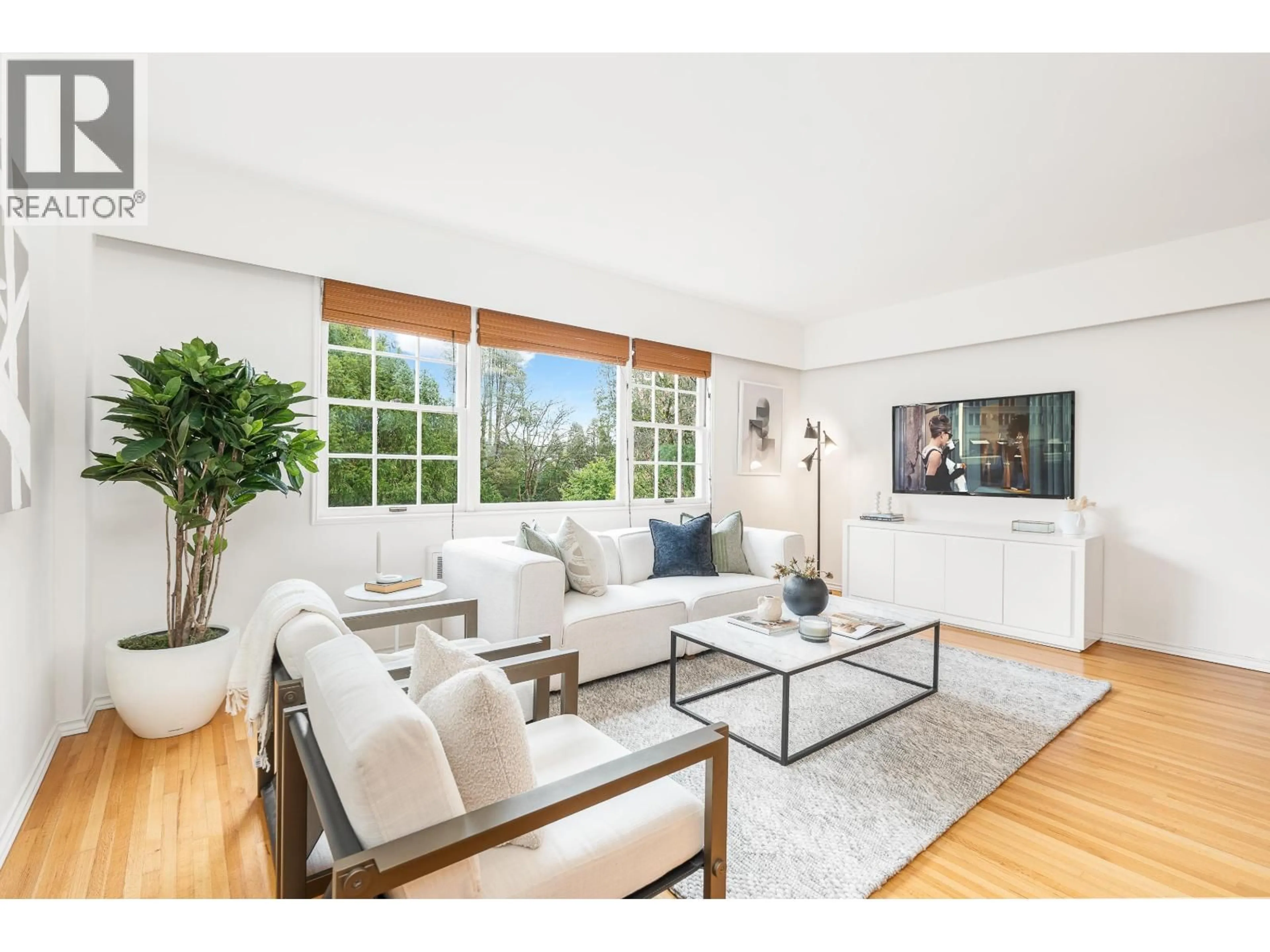 Living room with furniture, wood/laminate floor for 320 - 2890 POINT GREY ROAD, Vancouver British Columbia V6K1A9