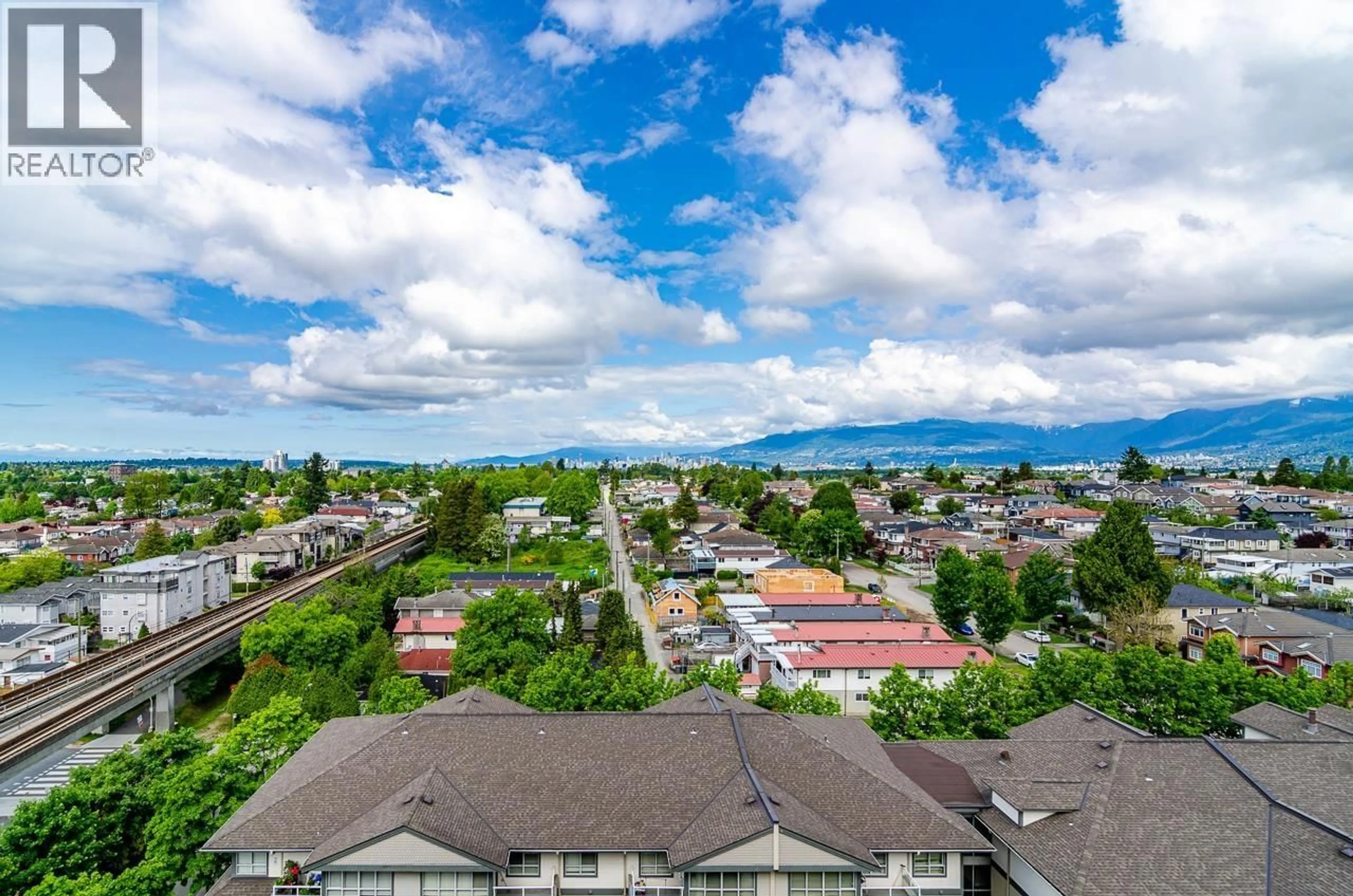 A pic from outside/outdoor area/front of a property/back of a property/a pic from drone, mountain view for 1206 - 3455 ASCOT PLACE, Vancouver British Columbia V5R6B7