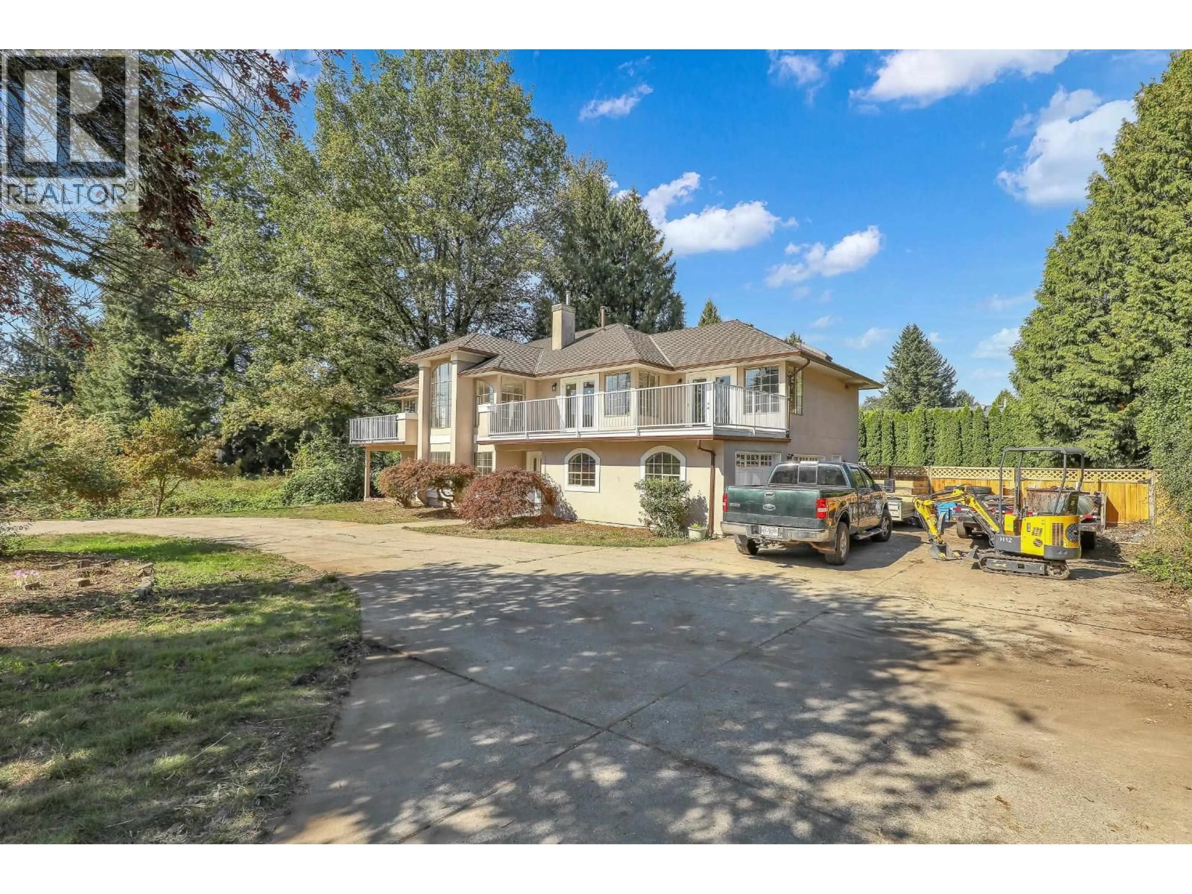 A pic from outside/outdoor area/front of a property/back of a property/a pic from drone, street for 21105 RIVER ROAD, Maple Ridge British Columbia V2X2A1