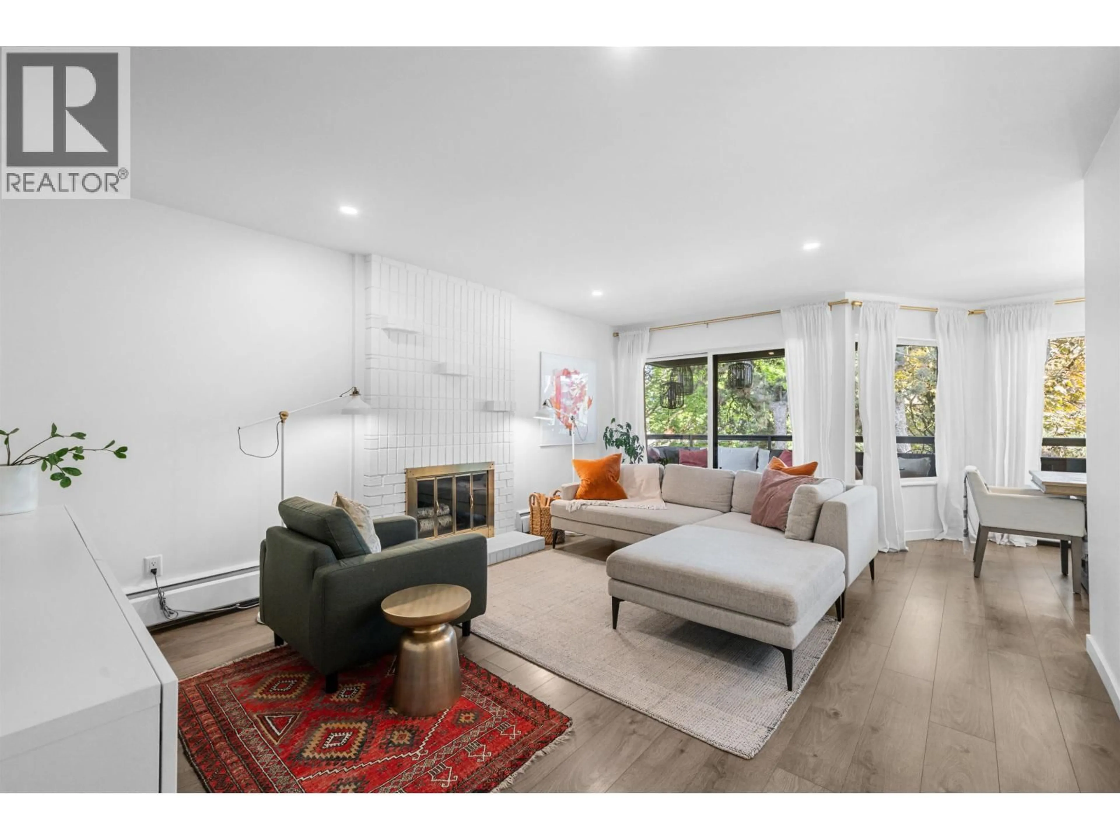 Living room with furniture, wood/laminate floor for 302 - 1720 12TH AVENUE, Vancouver British Columbia V6J2E6