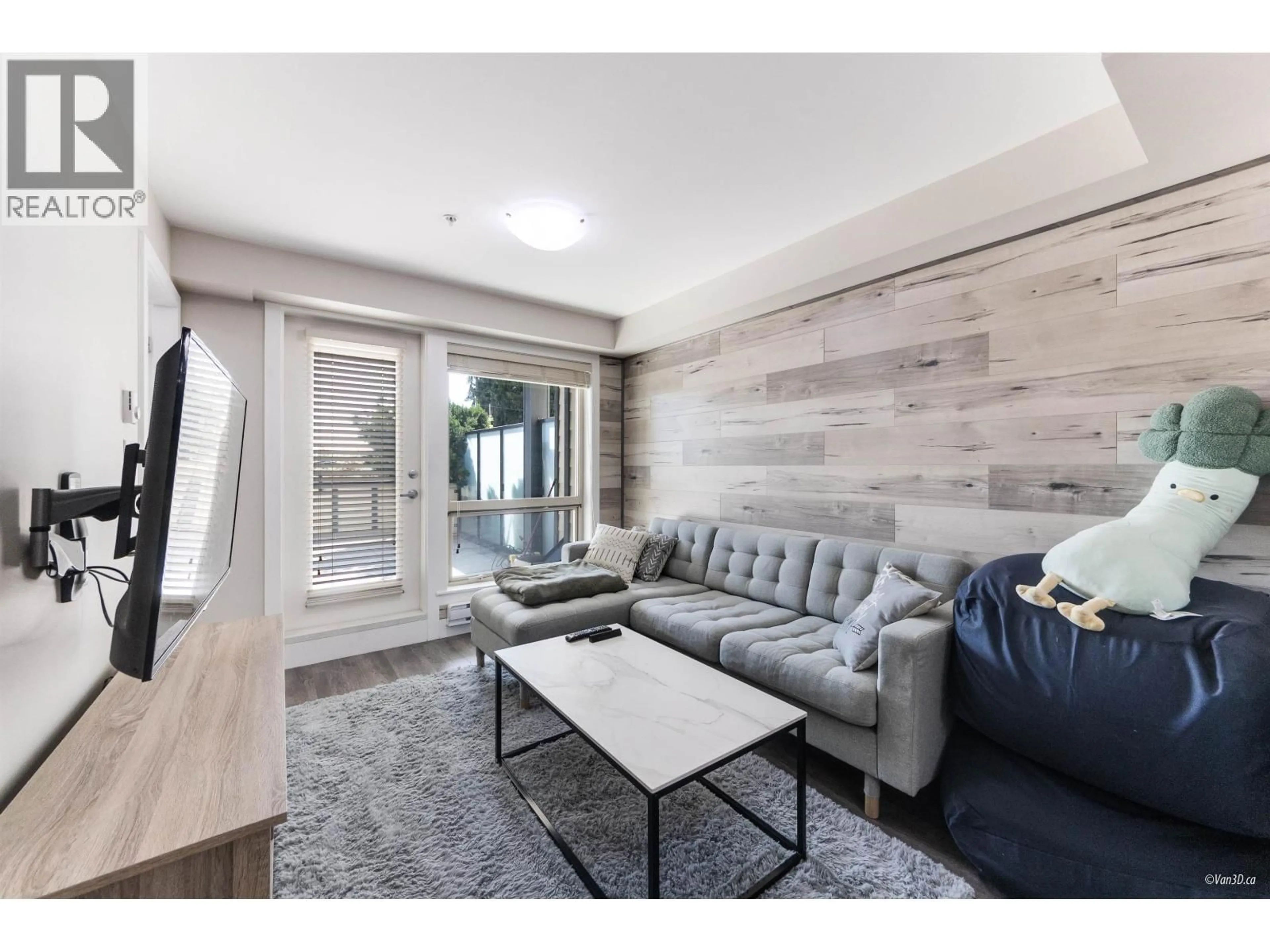 Living room with furniture, wood/laminate floor for 206 - 707 43RD AVENUE, Vancouver British Columbia V5W0C1