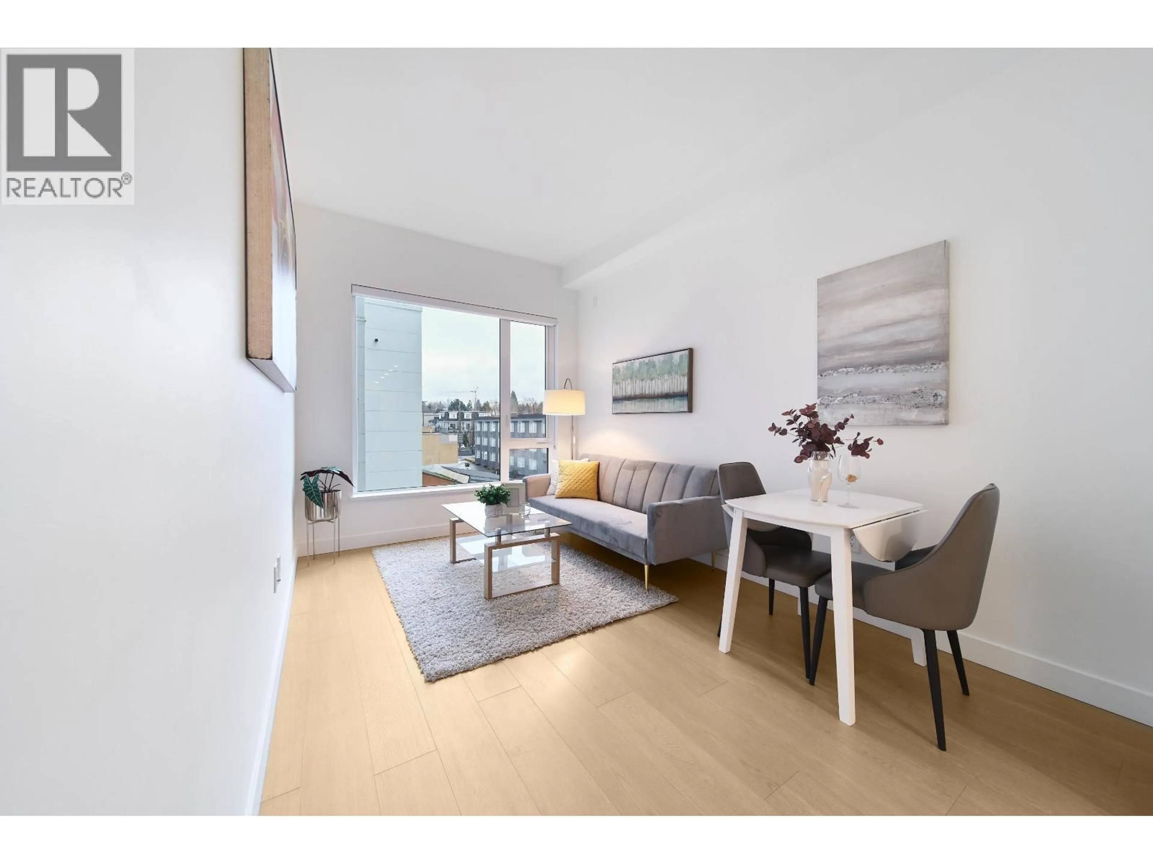 Living room with furniture, wood/laminate floor for 410 - 8888 OSLER STREET, Vancouver British Columbia V6P4G2