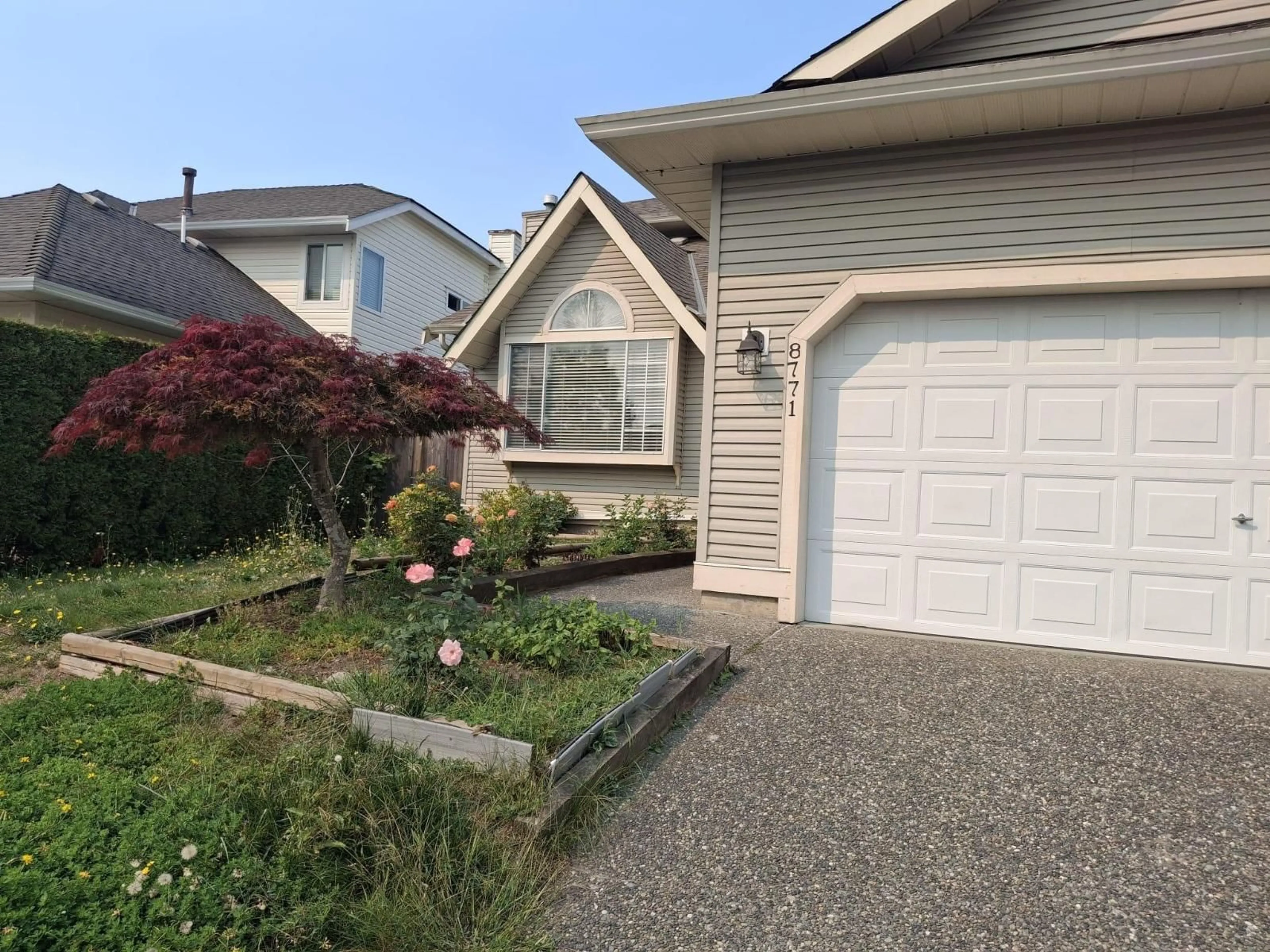 Home with vinyl exterior material, street for 8771 143, Surrey British Columbia V3W4G4