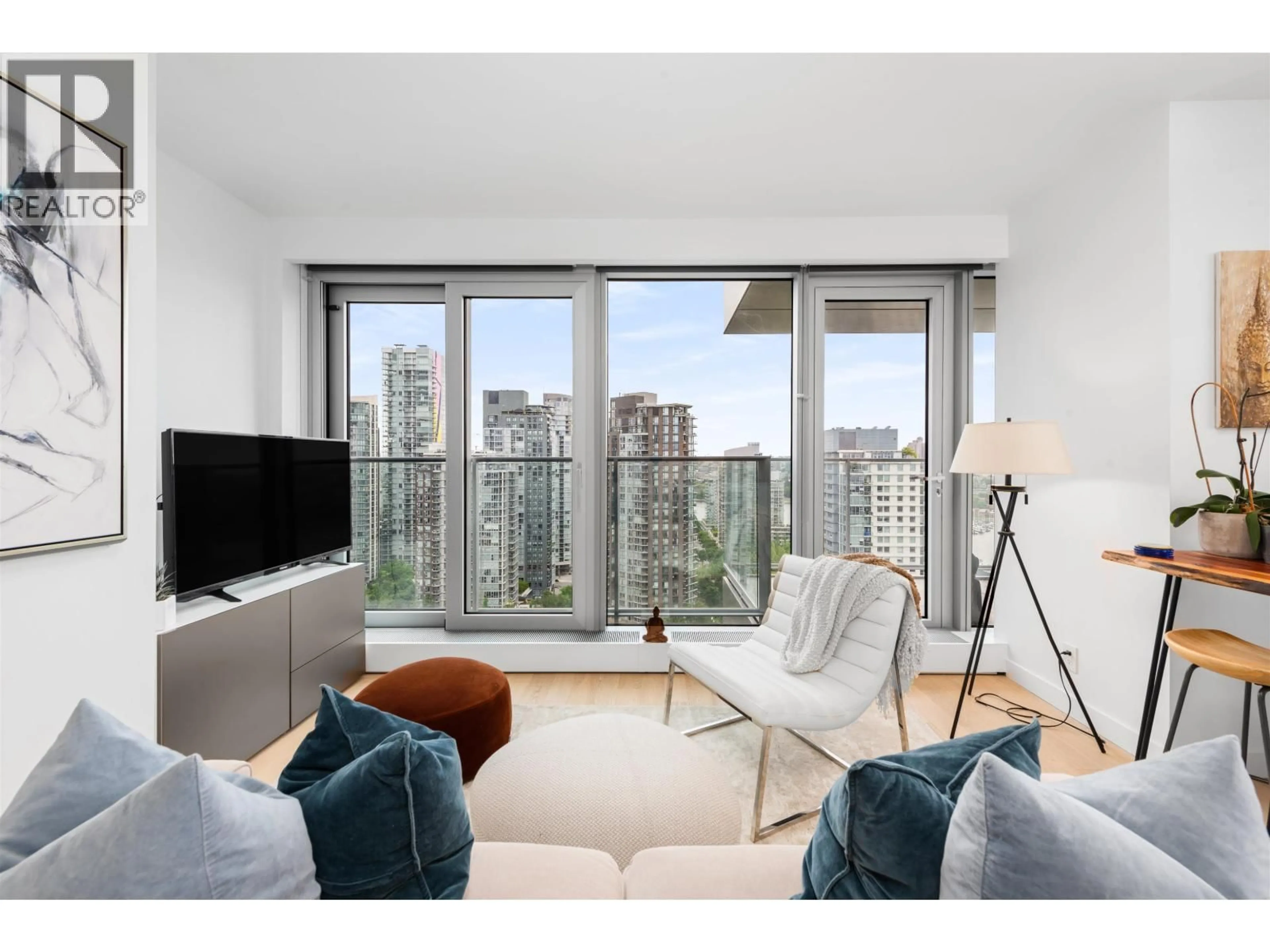 Living room with furniture, wood/laminate floor for 2702 - 1480 HOWE STREET, Vancouver British Columbia V6Z0G5