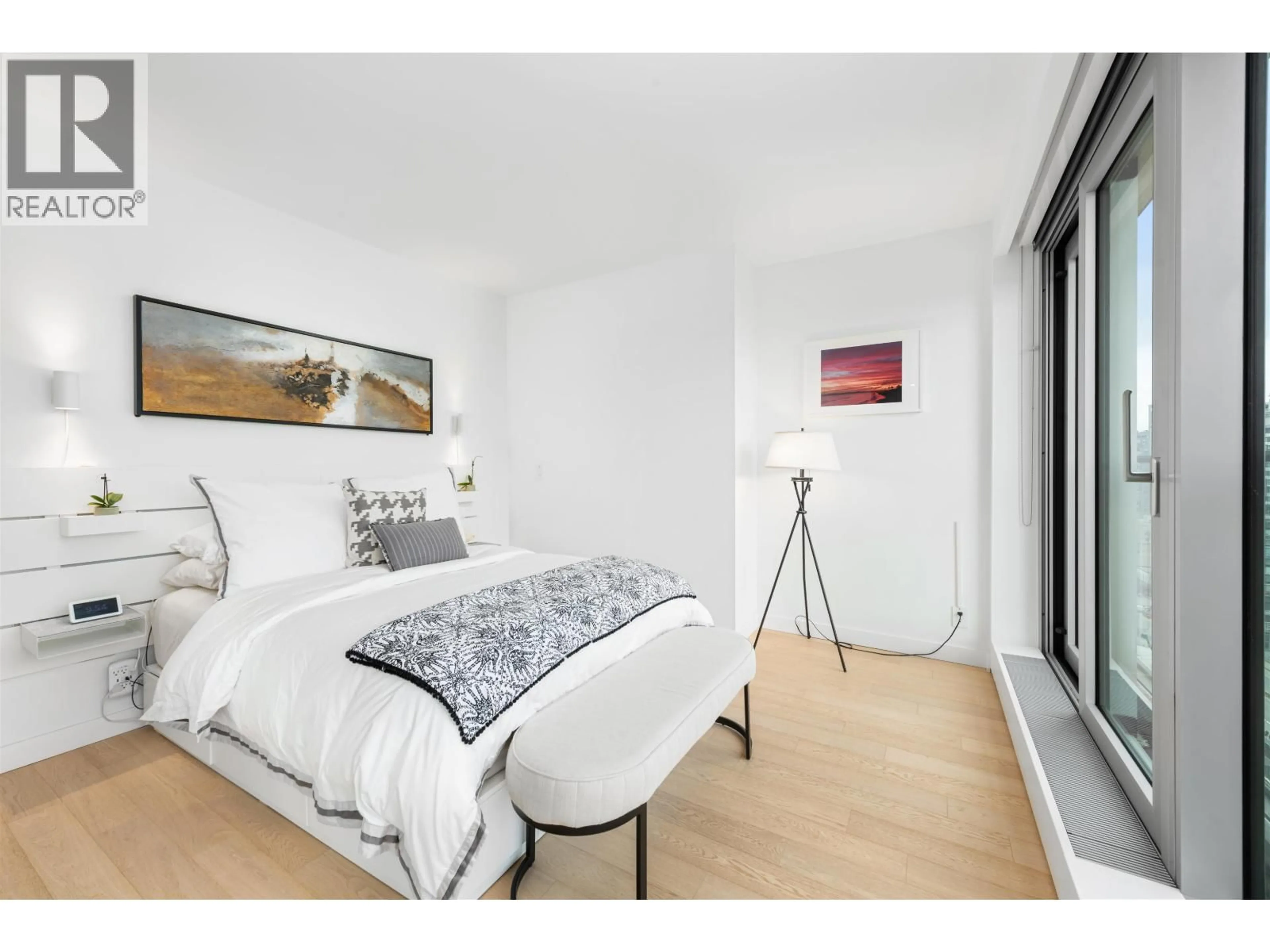 Bedroom with bed, wood/laminate floor for 2702 - 1480 HOWE STREET, Vancouver British Columbia V6Z0G5