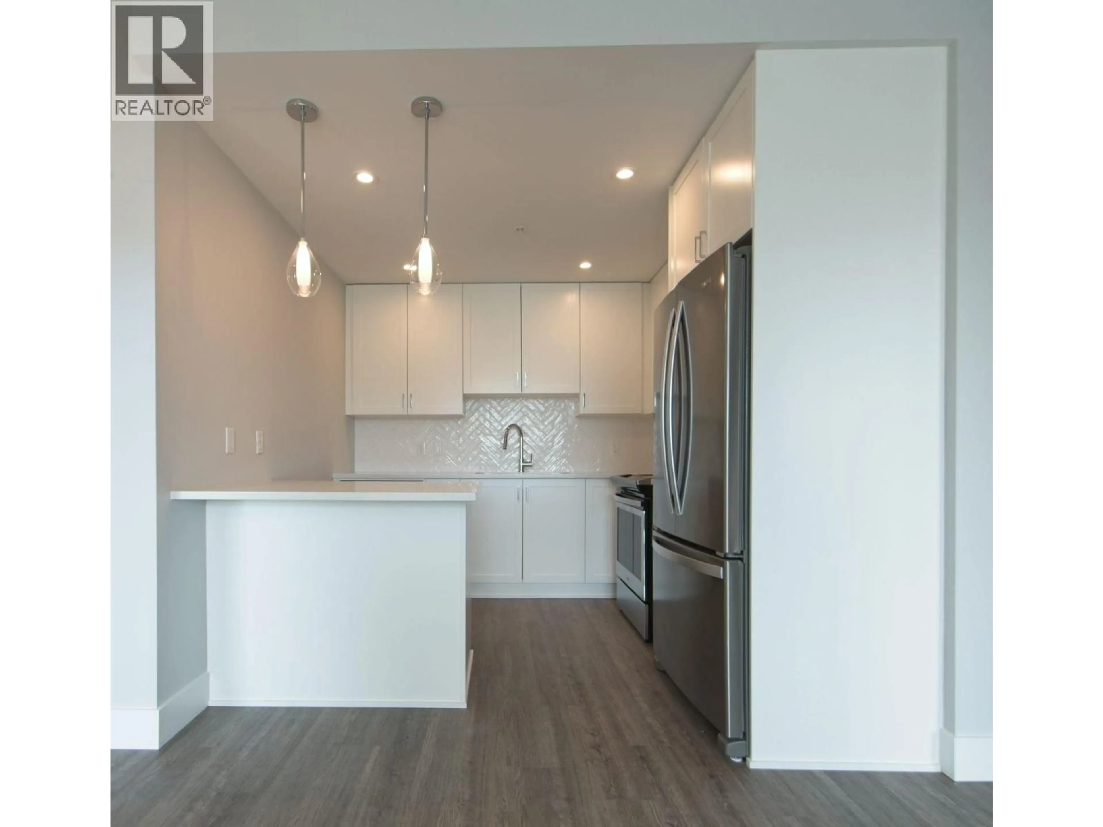 Open concept kitchen, wood/laminate floor for 4607 - 2180 KELLY AVENUE, Port Coquitlam British Columbia V3C3S6