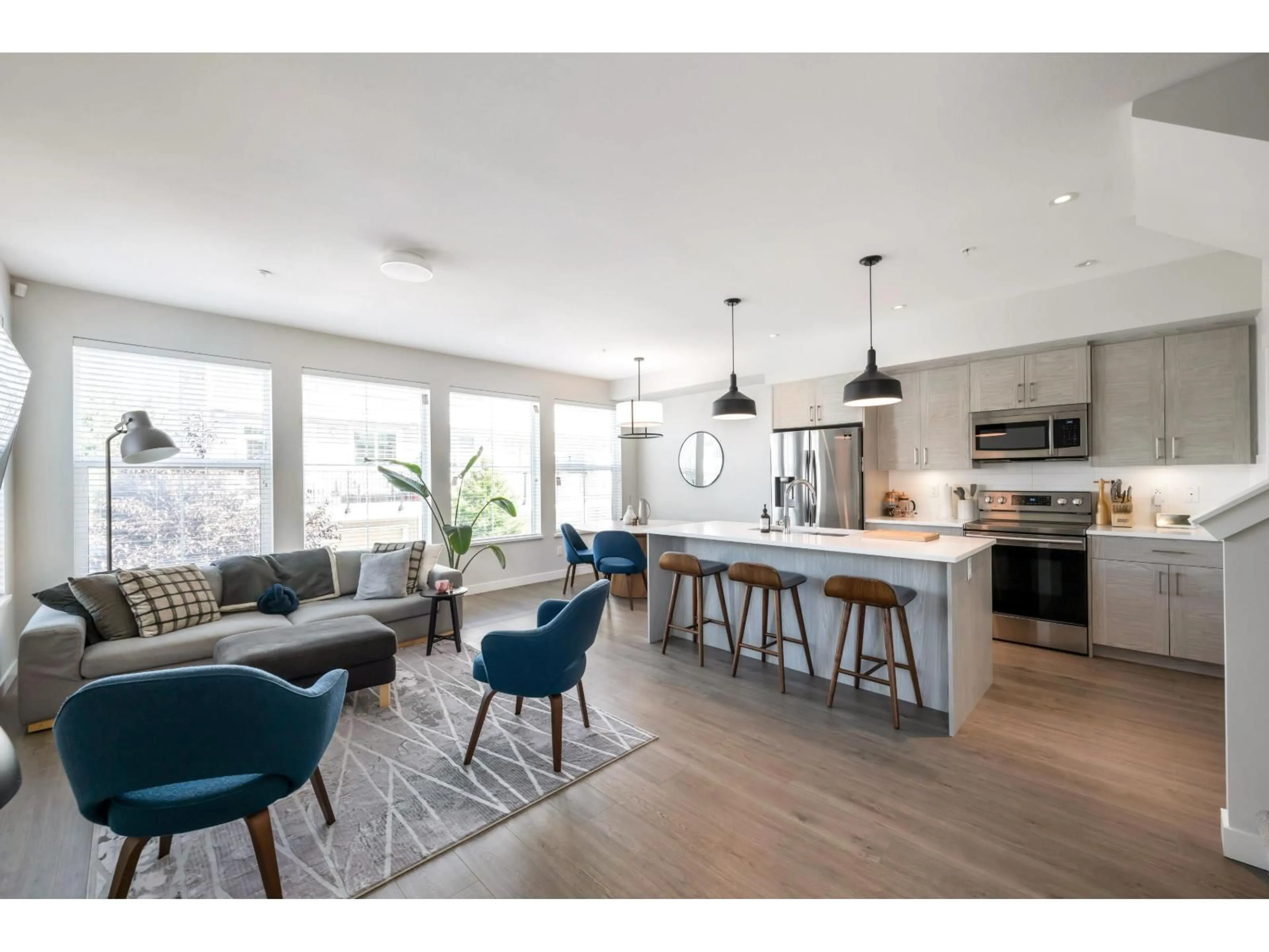 Open concept kitchen, wood/laminate floor for 30 - 8371 202B, Langley British Columbia V2Y1S8