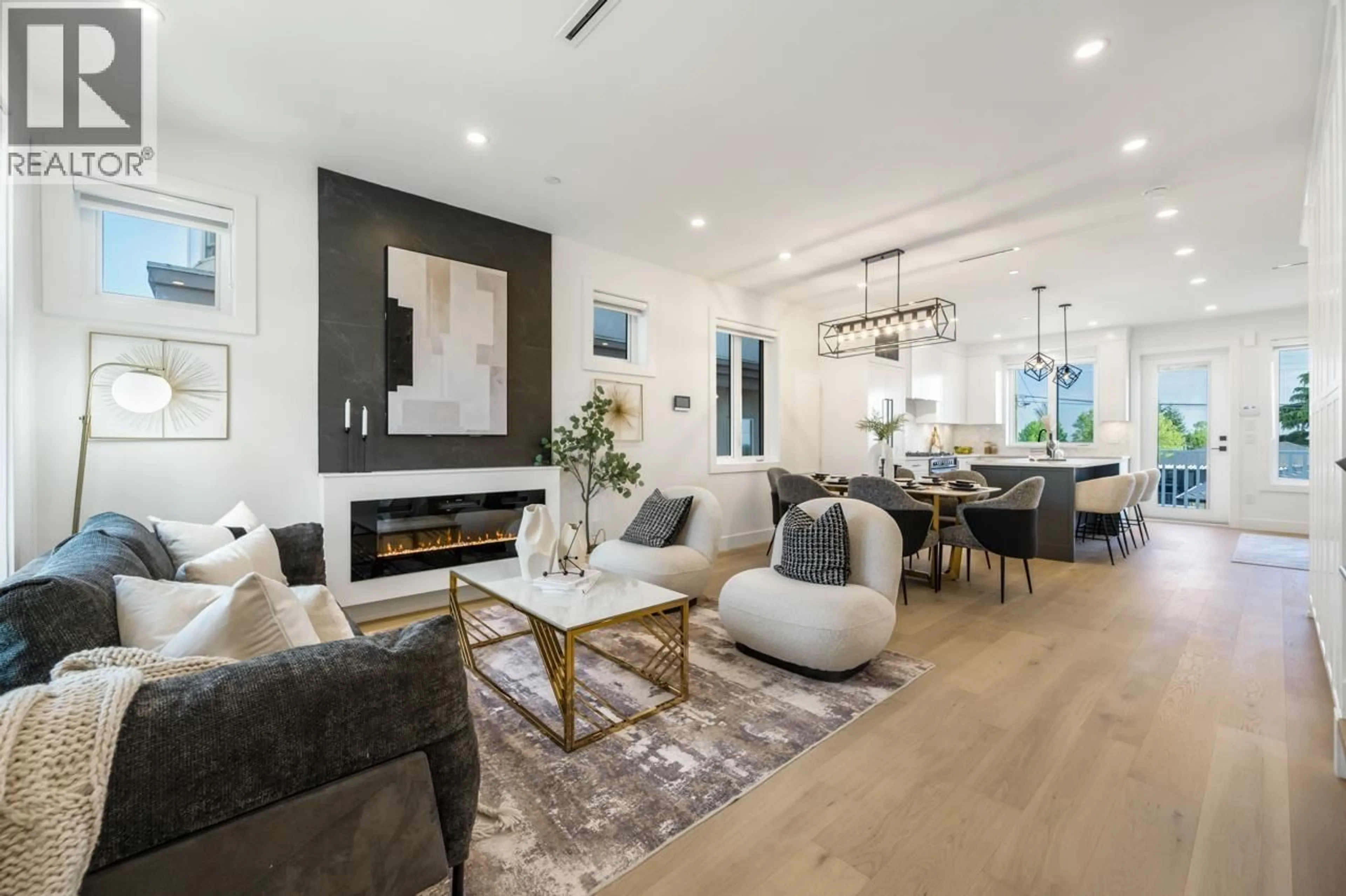 Living room with furniture, wood/laminate floor for 1724 64TH AVENUE, Vancouver British Columbia V5P2M7