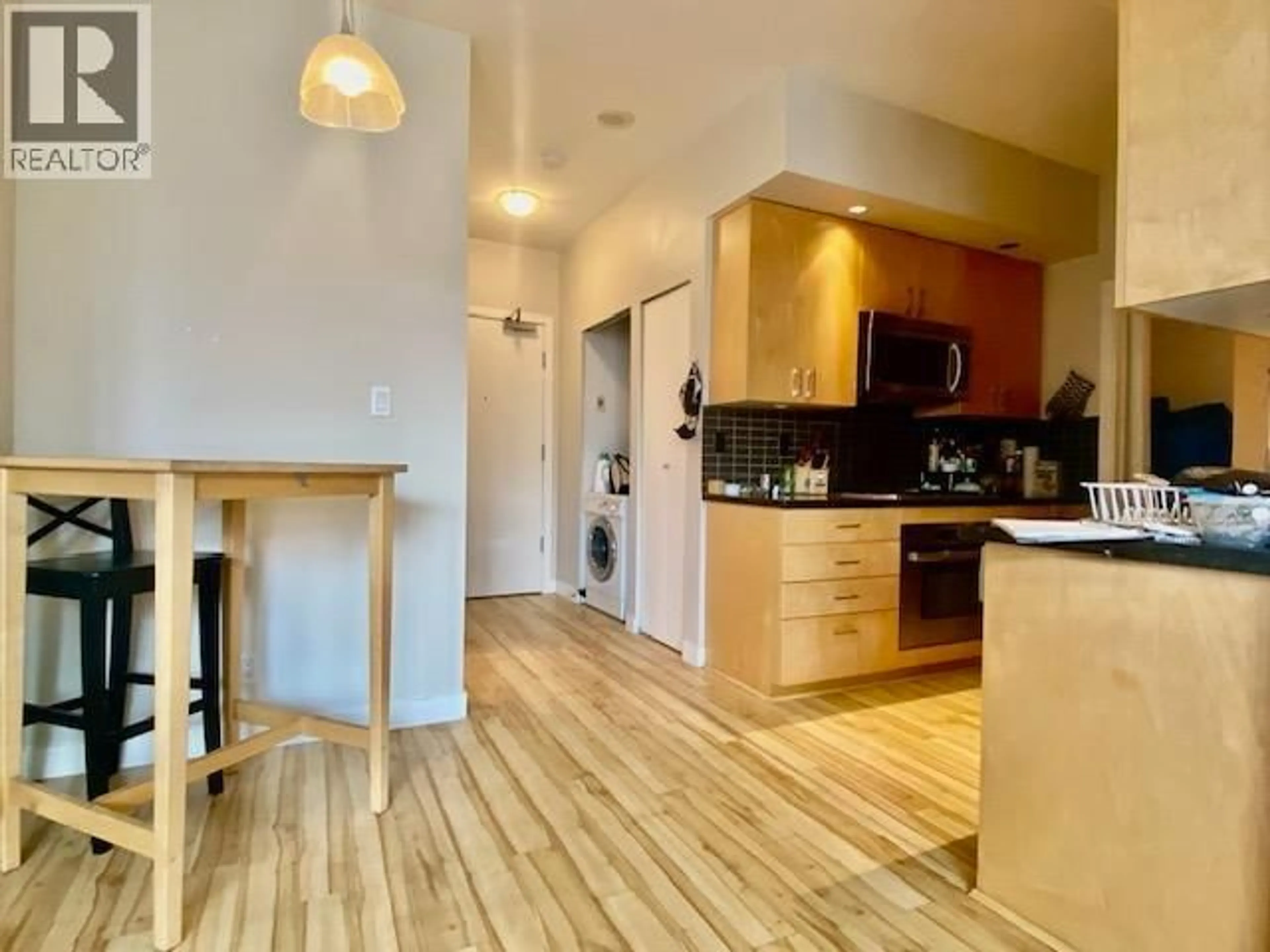 Open concept kitchen, wood/laminate floor for 204 - 1050 SMITHE STREET, Vancouver British Columbia V6E4H2