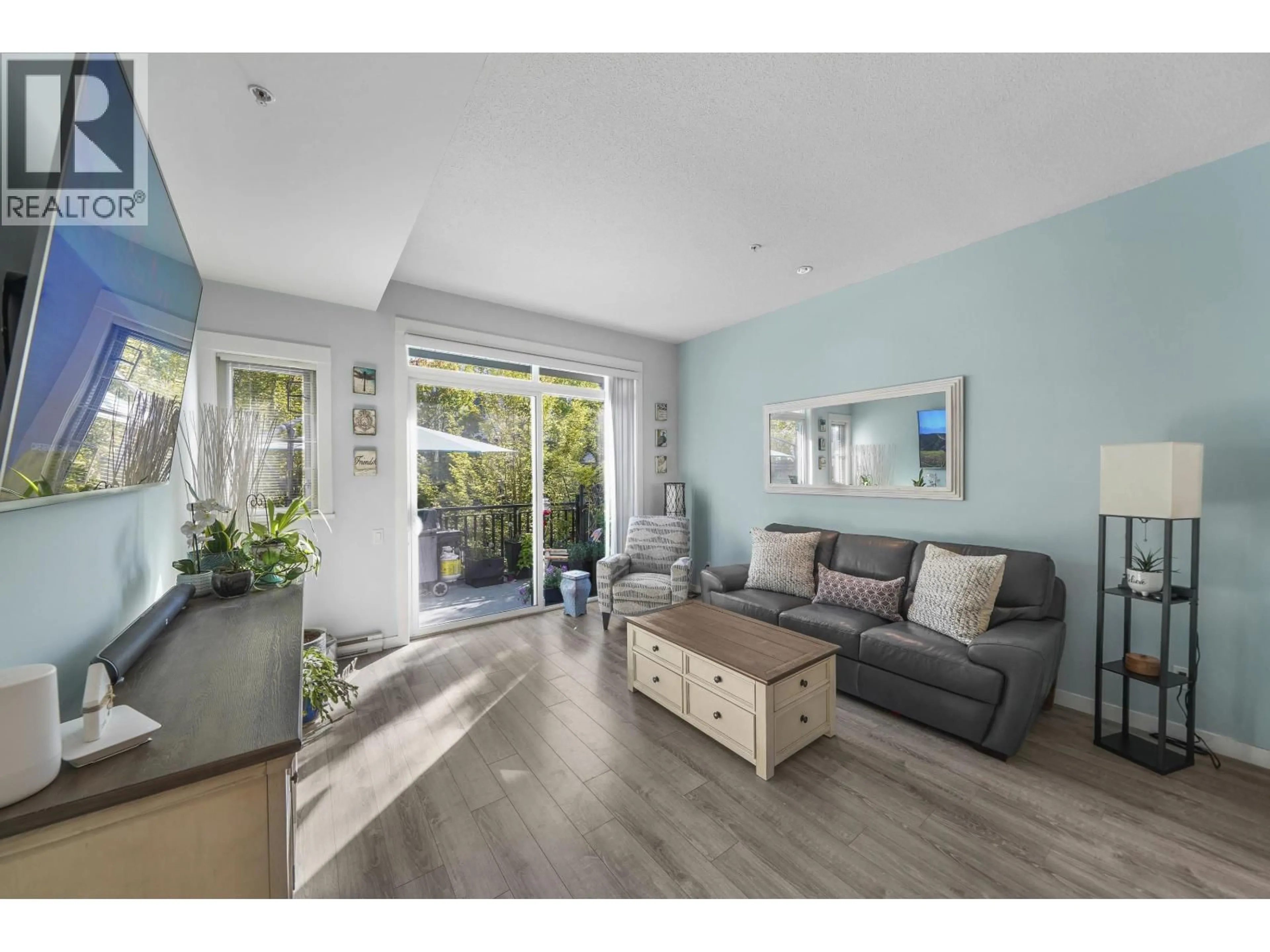 Living room with furniture, wood/laminate floor for 21 - 2358 RANGER LANE, Port Coquitlam British Columbia V3B0L5
