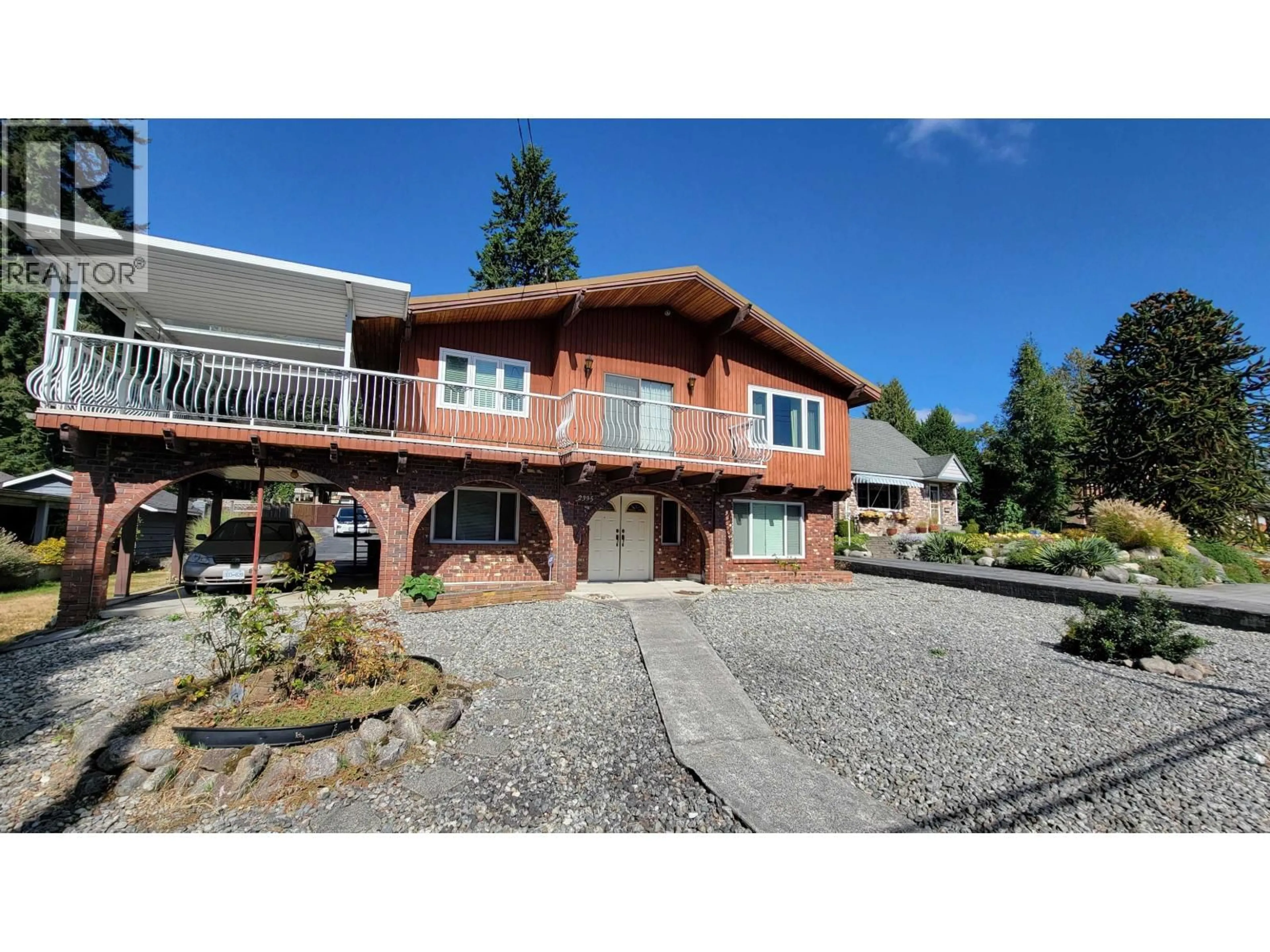 A pic from outside/outdoor area/front of a property/back of a property/a pic from drone, street for 2395 AUSTIN AVENUE, Coquitlam British Columbia V3K3R9