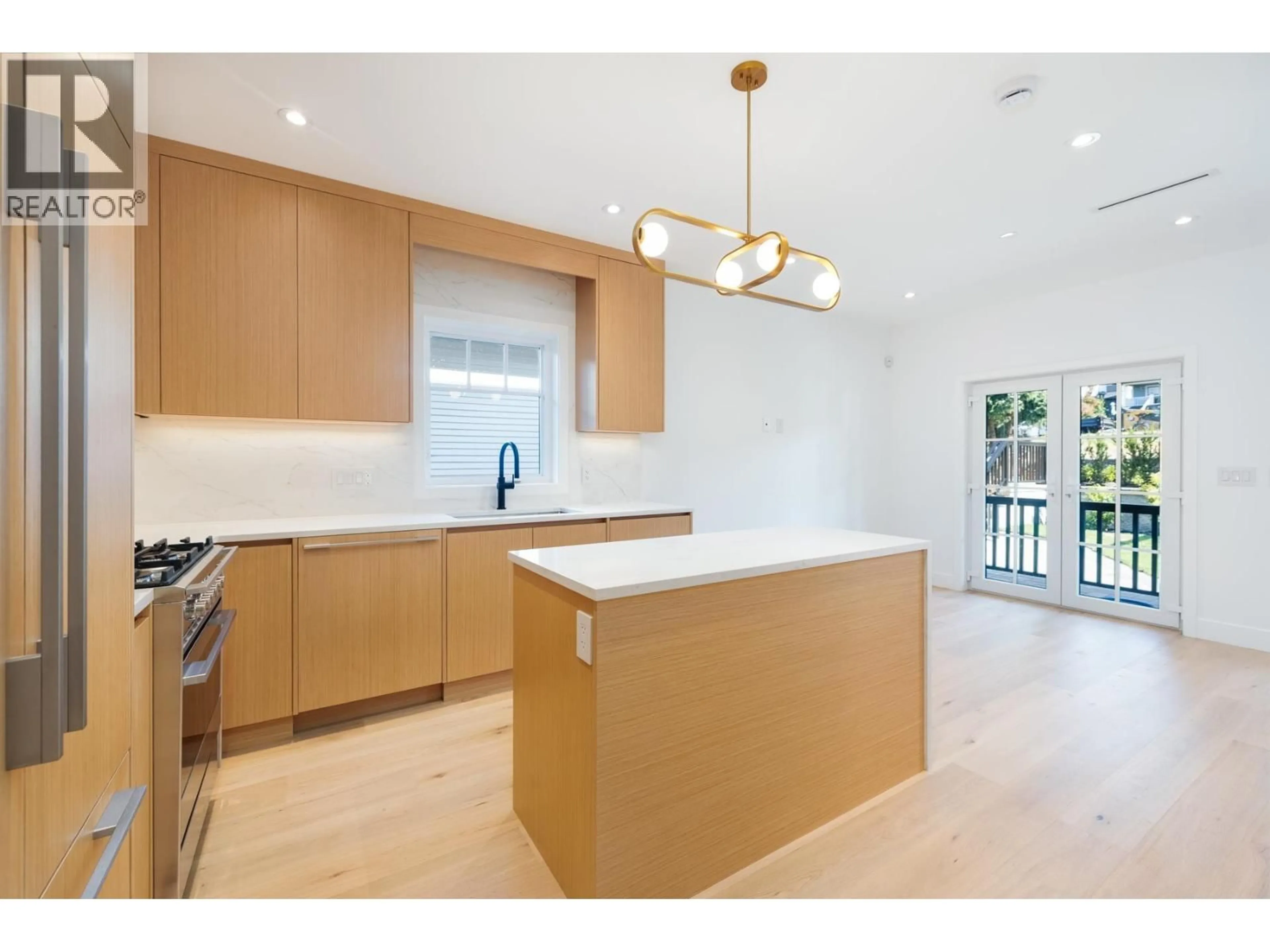 Open concept kitchen, unknown for 263 6TH STREET, North Vancouver British Columbia V7M1K7