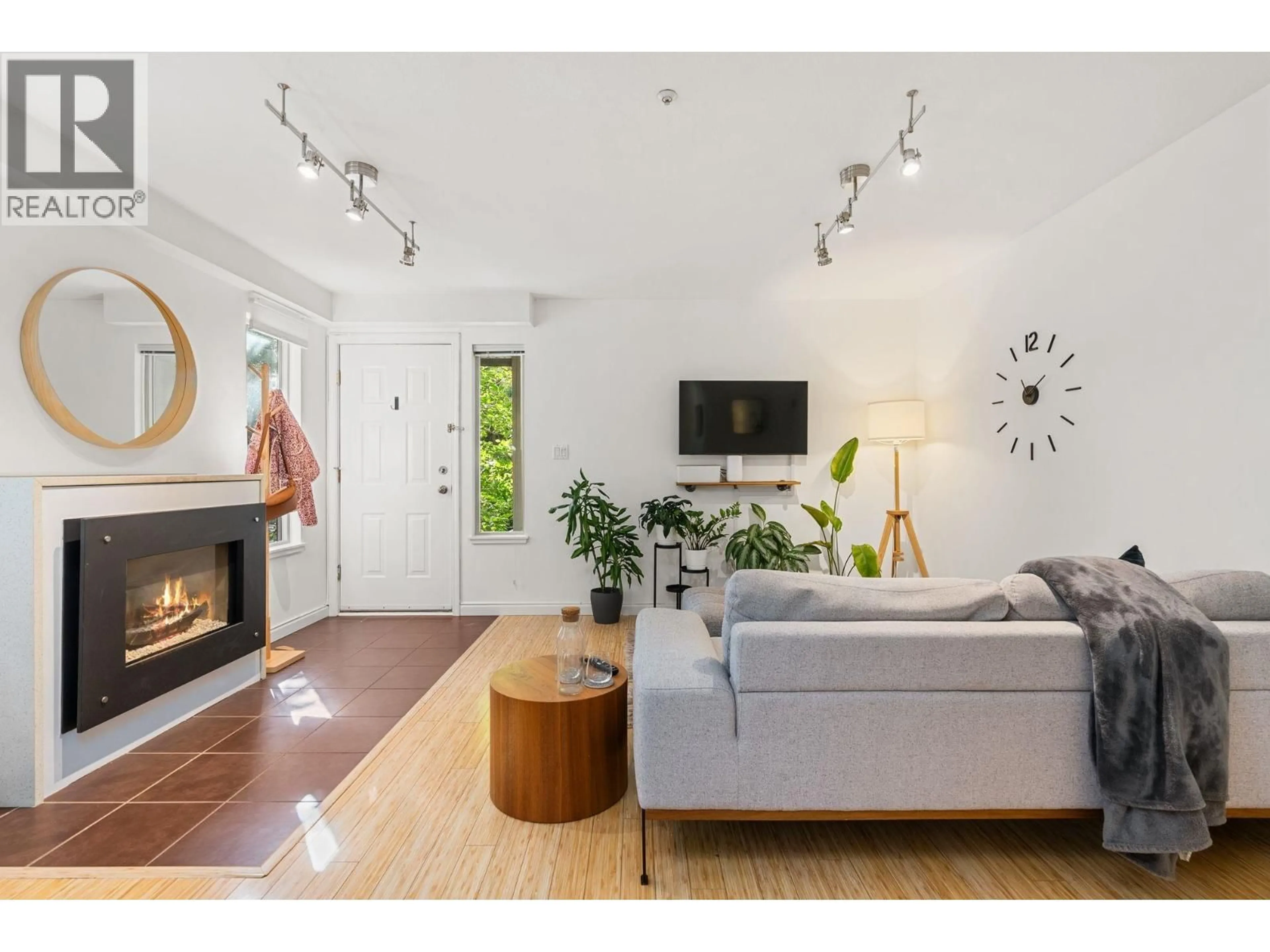 Living room with furniture, wood/laminate floor for 103 - 755 15TH AVENUE, Vancouver British Columbia V5Z1R6