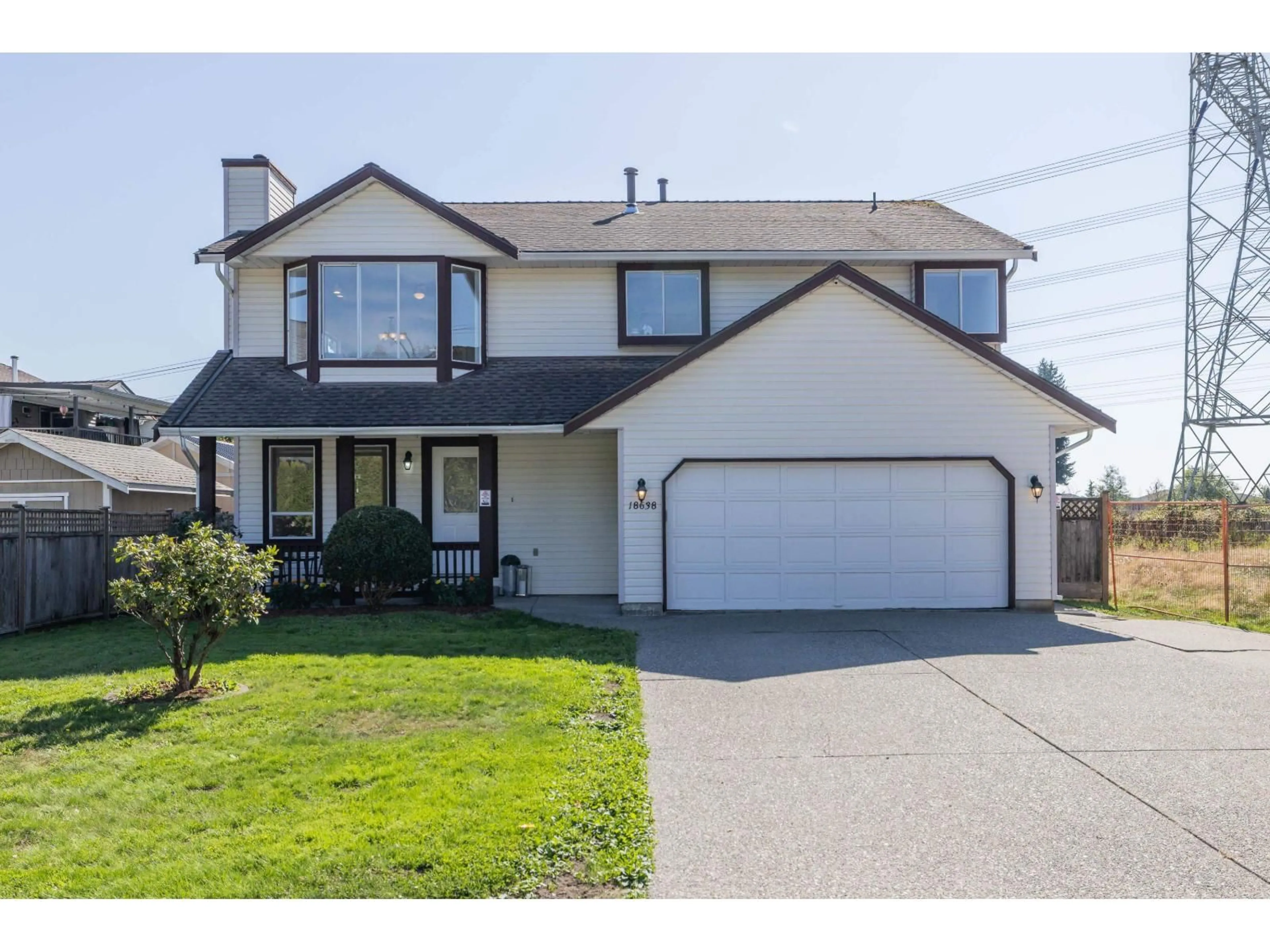 Home with vinyl exterior material, street for 18638 59, Surrey British Columbia V3S7Z8