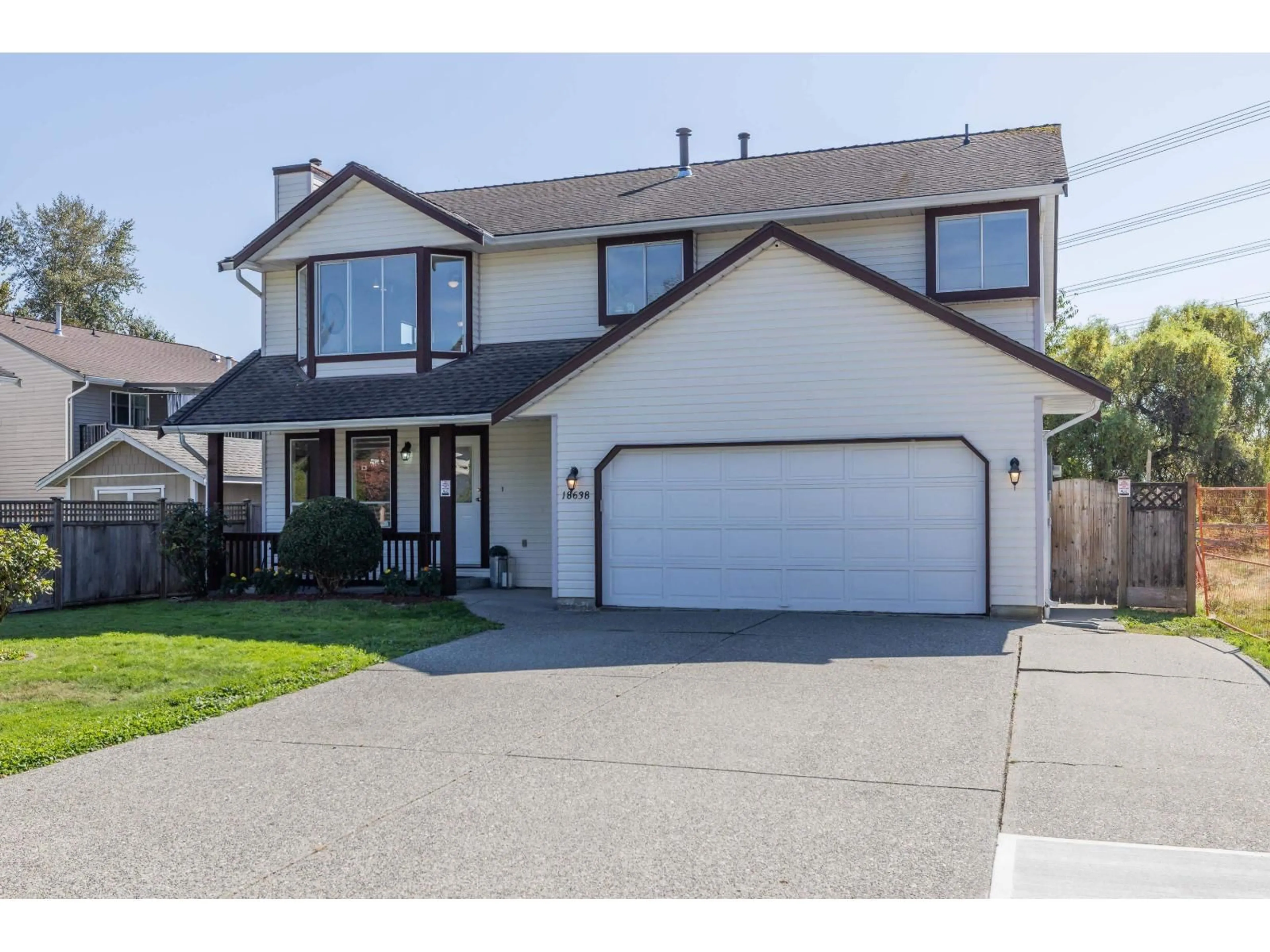 Home with vinyl exterior material, street for 18638 59, Surrey British Columbia V3S7Z8