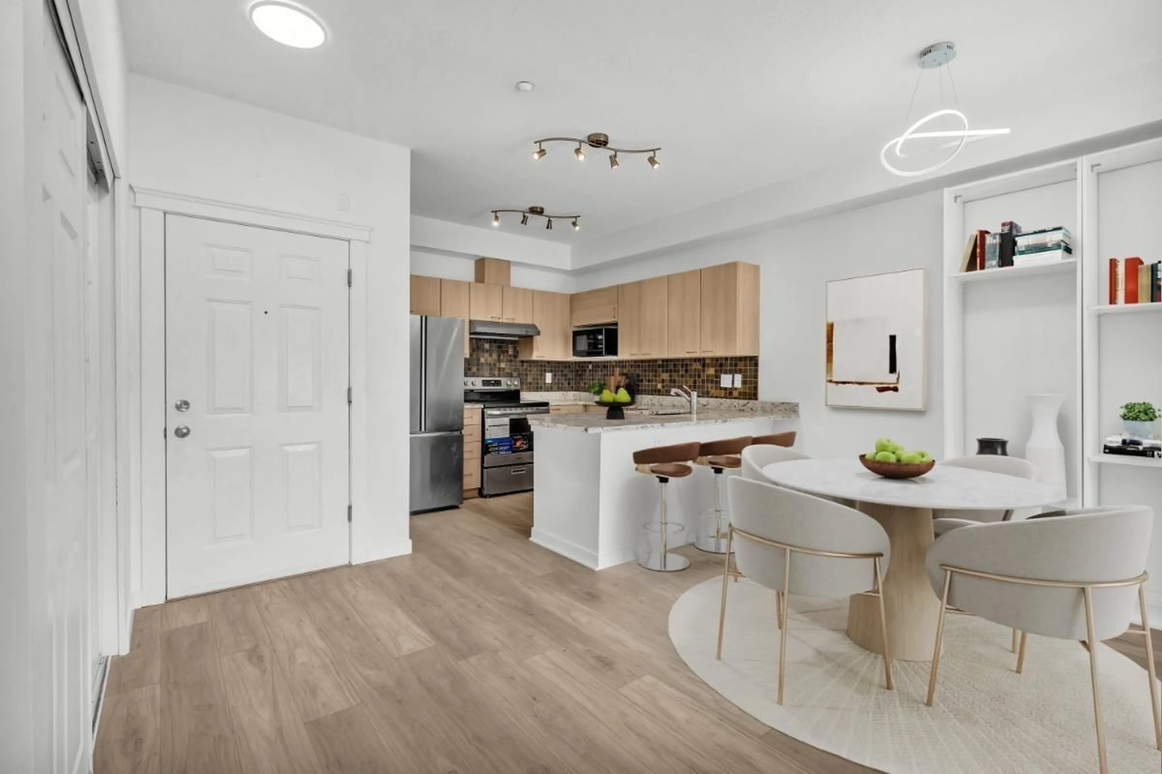 Open concept kitchen, wood/laminate floor for 211 - 12083 92A, Surrey British Columbia V3V8C8