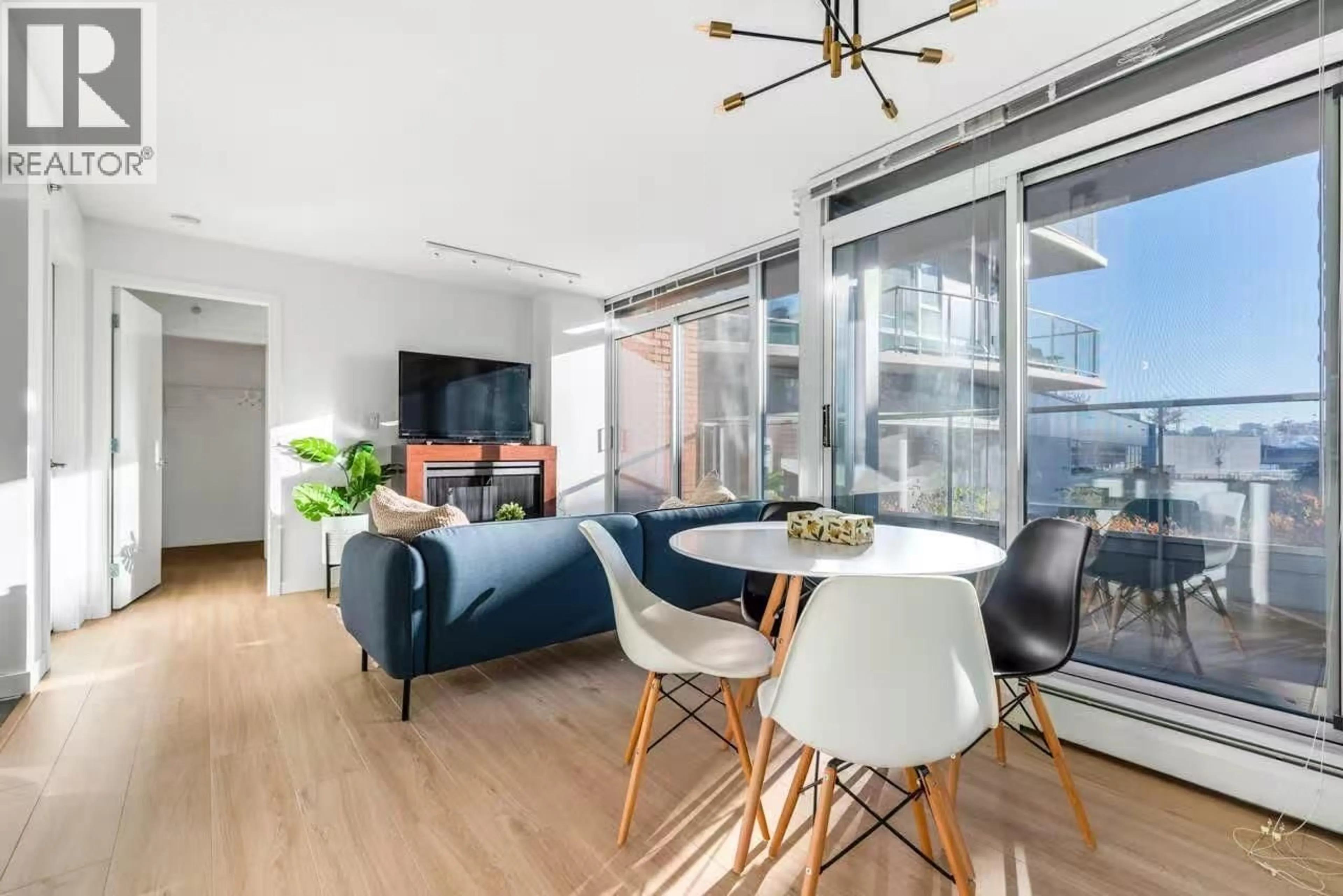 Living room with furniture, wood/laminate floor for 518 - 618 ABBOTT STREET, Vancouver British Columbia V6B0C1