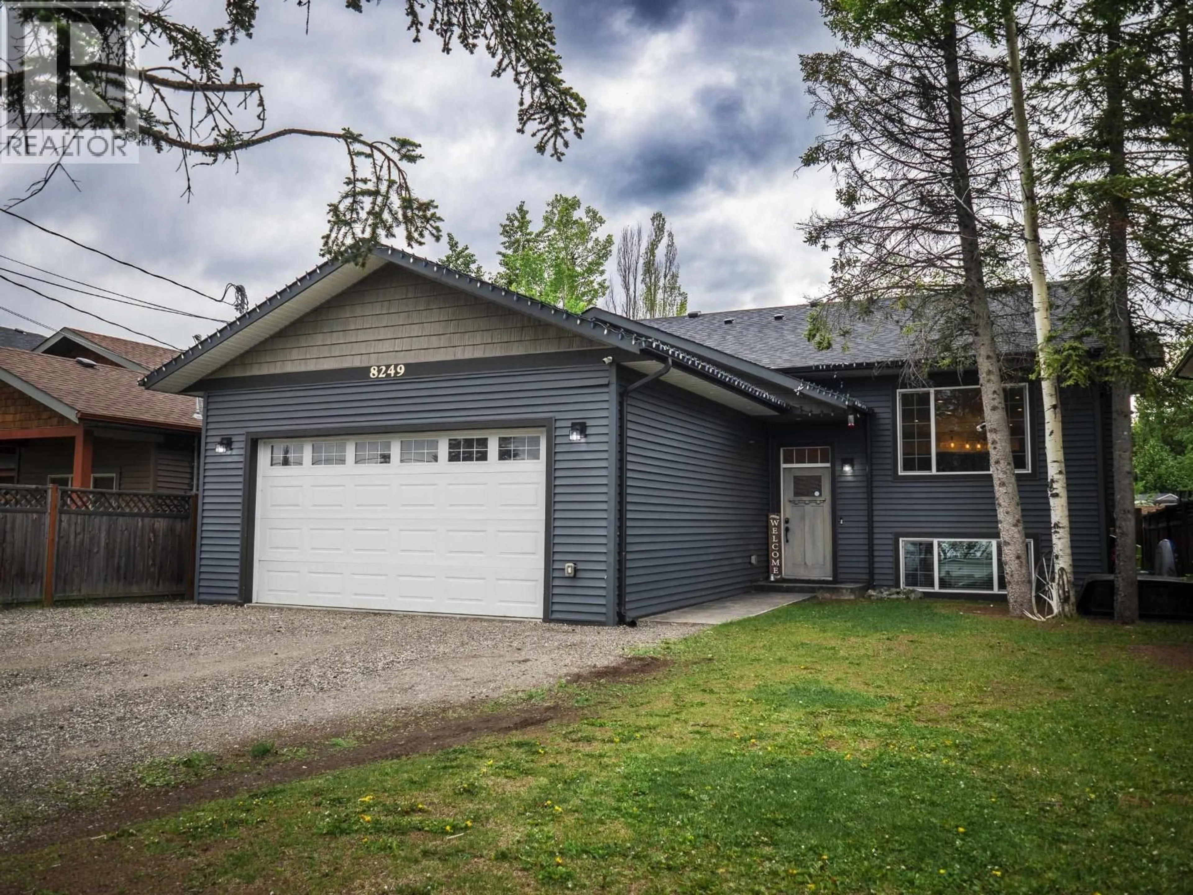 Home with vinyl exterior material, street for 8249 PETER ROAD, Prince George British Columbia V2K0B2