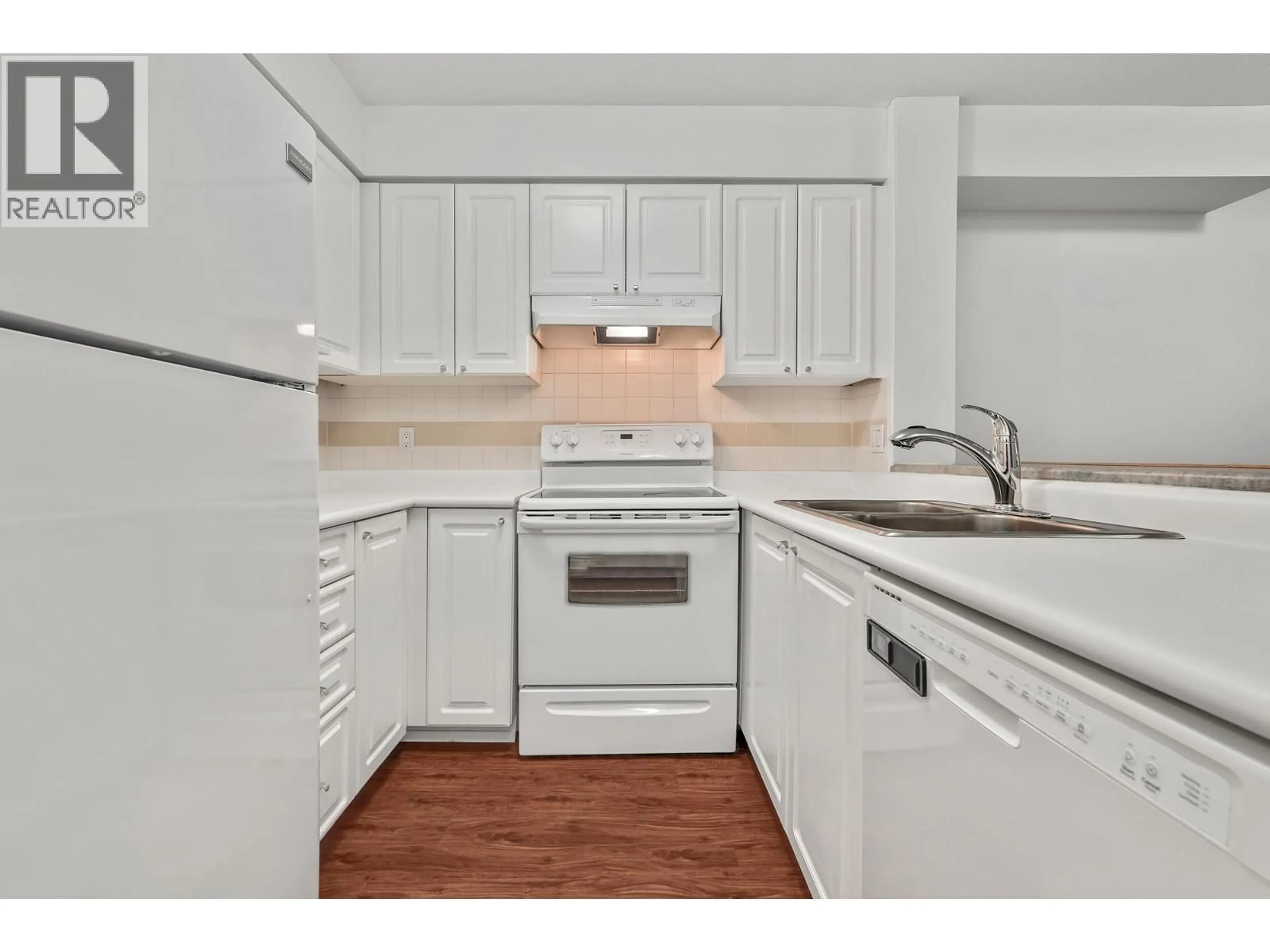 Standard kitchen, wood/laminate floor for 102 - 8989 HUDSON STREET, Vancouver British Columbia V6P6Y1