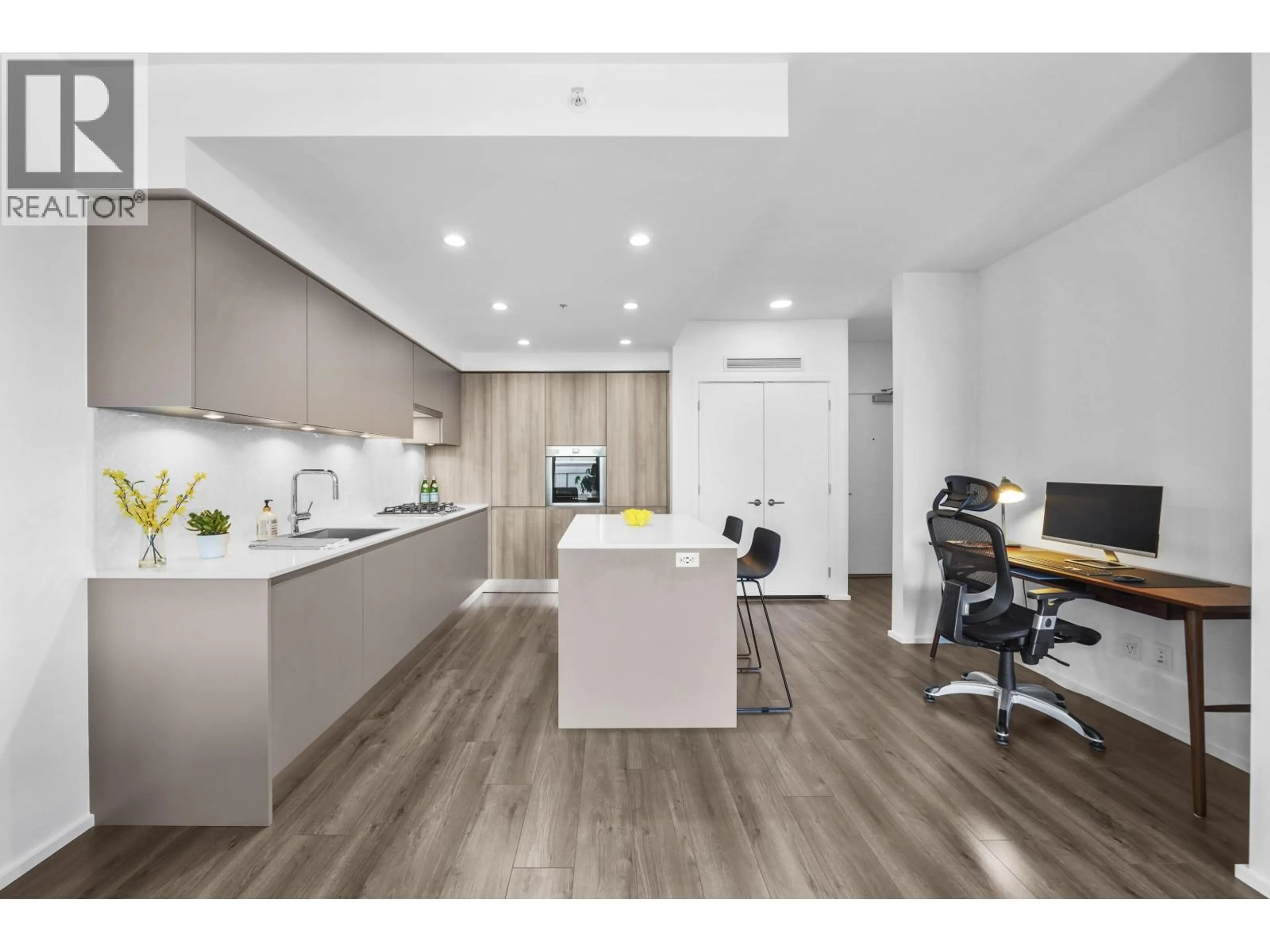 Open concept kitchen, wood/laminate floor for 4104 - 3833 EVERGREEN PLACE, Burnaby British Columbia V3J0M2