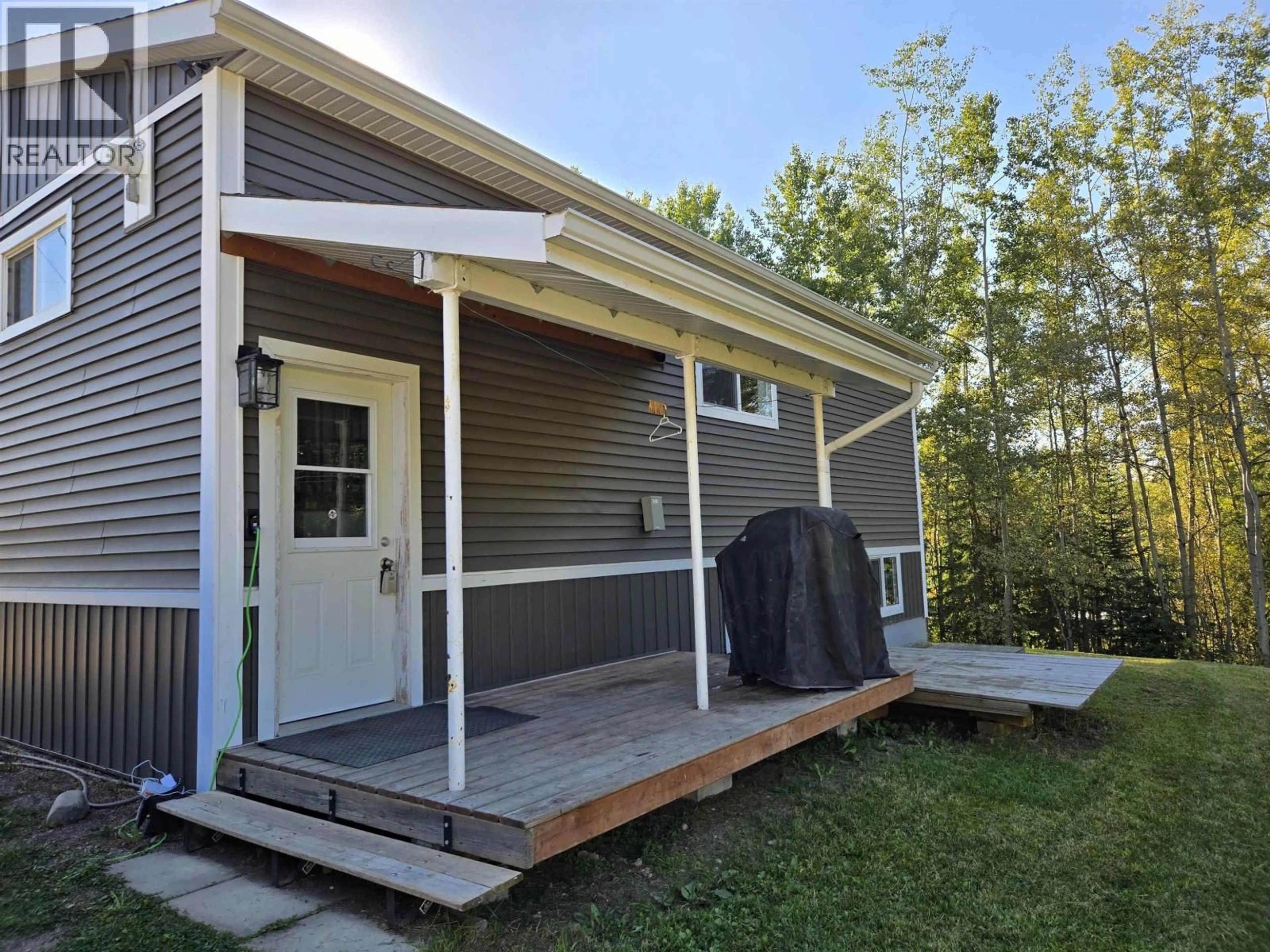 Home with vinyl exterior material, street for 9580 SIX MILE LAKE ROAD, Prince George British Columbia V2N6V3