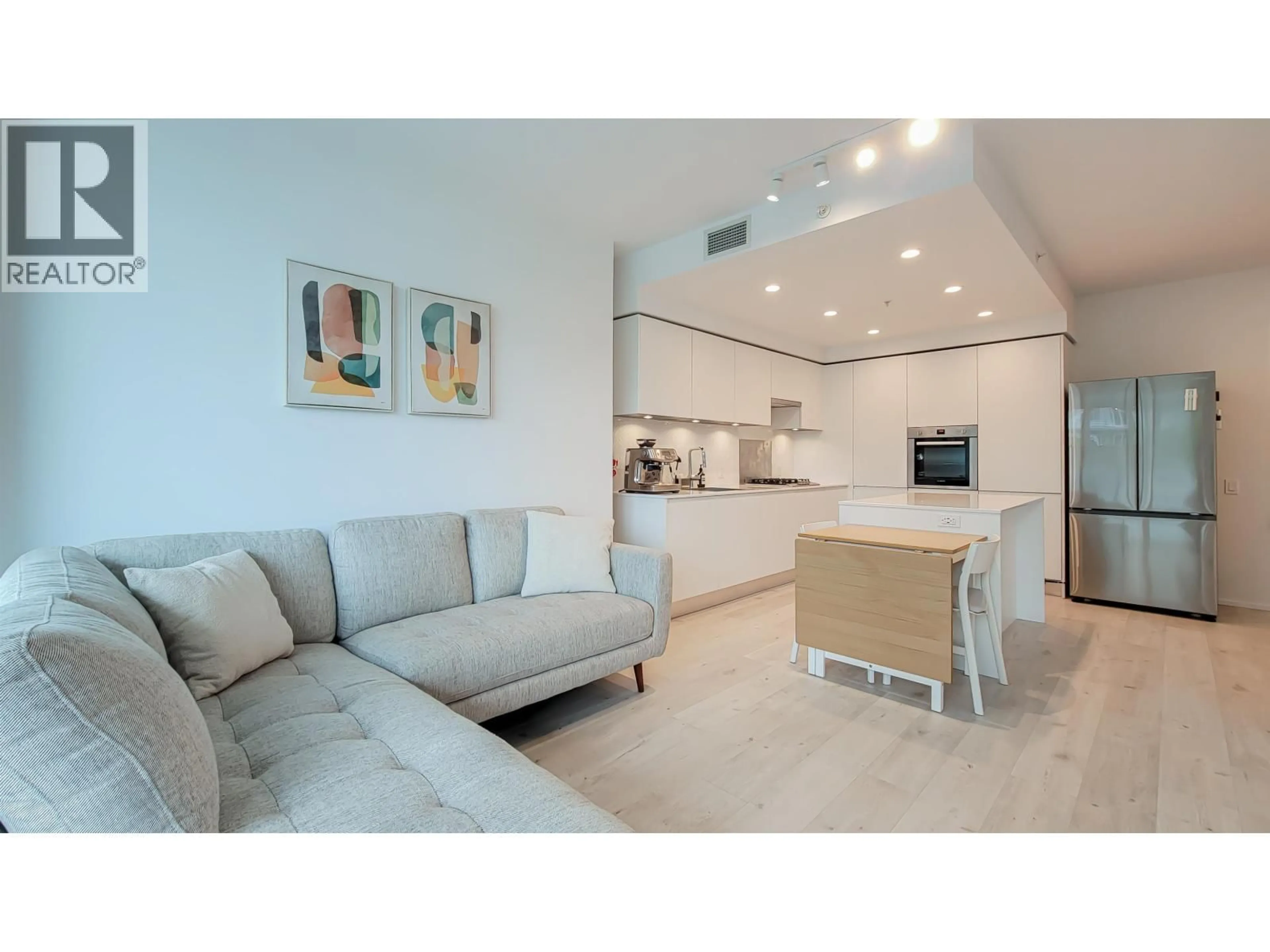 Living room with furniture, unknown for 711 - 3833 EVERGREEN PLACE, Burnaby British Columbia V3J0M2